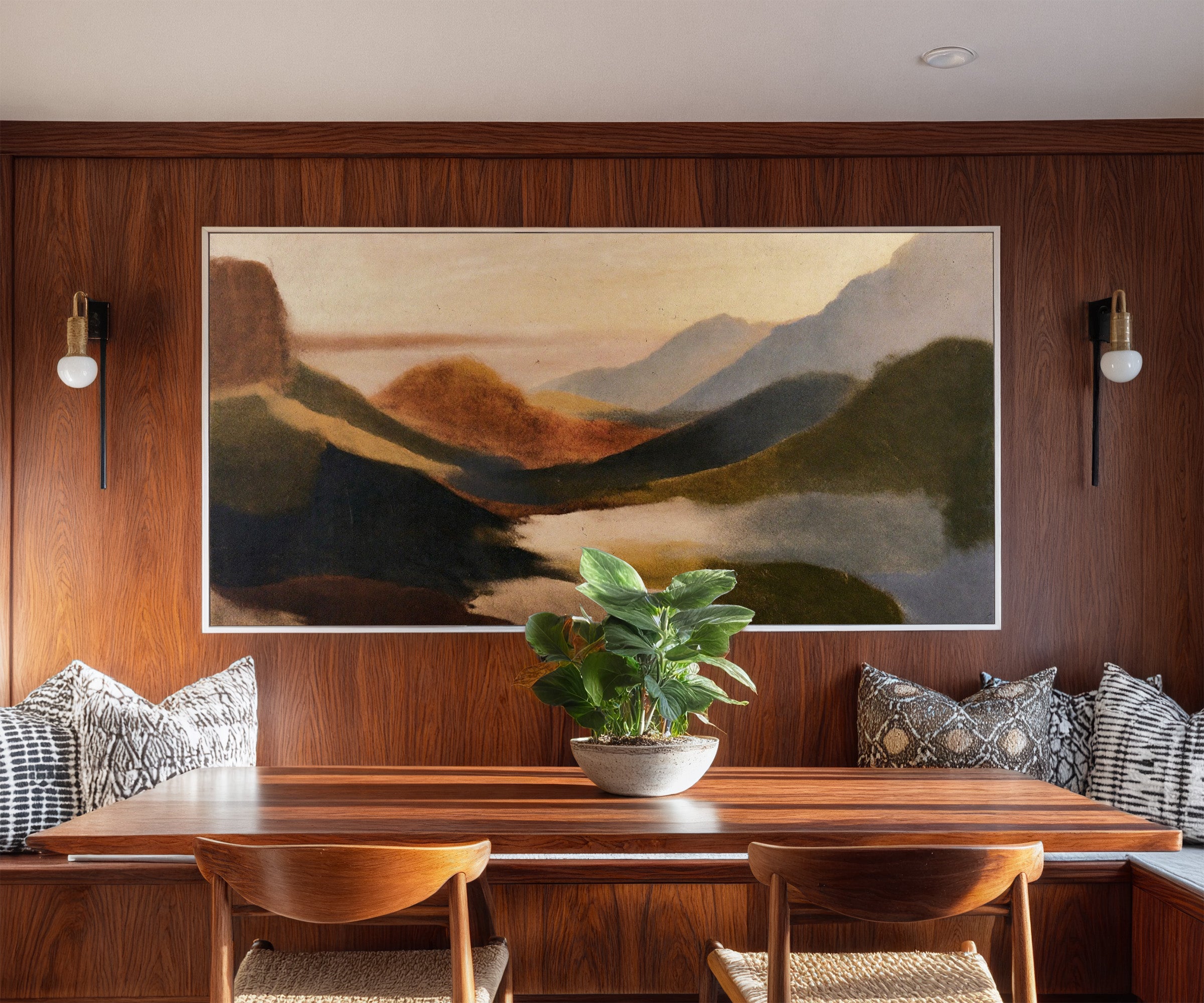 layered coastal landscape with dark headlands, canvas wall art in a white frame in a styled room setting