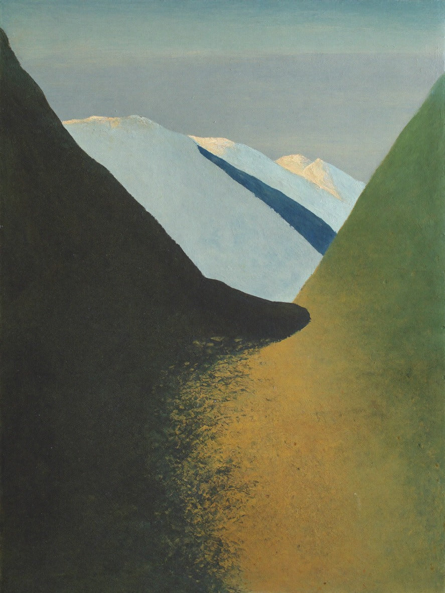 Dark slopes frame pale blue peaks and a gold valley beneath a soft gray sky