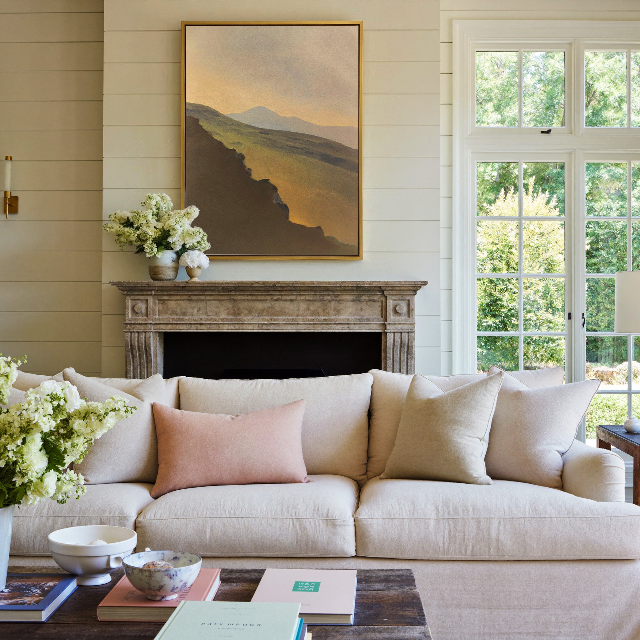golden valley with dark foreground ridge canvas wall art in a gold frame above a mantel