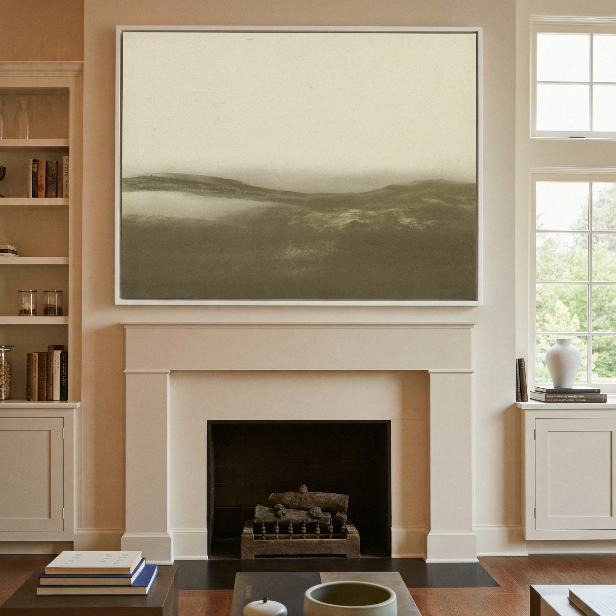 soft sepia mist over low rolling hills canvas wall art in a white frame above a mantel