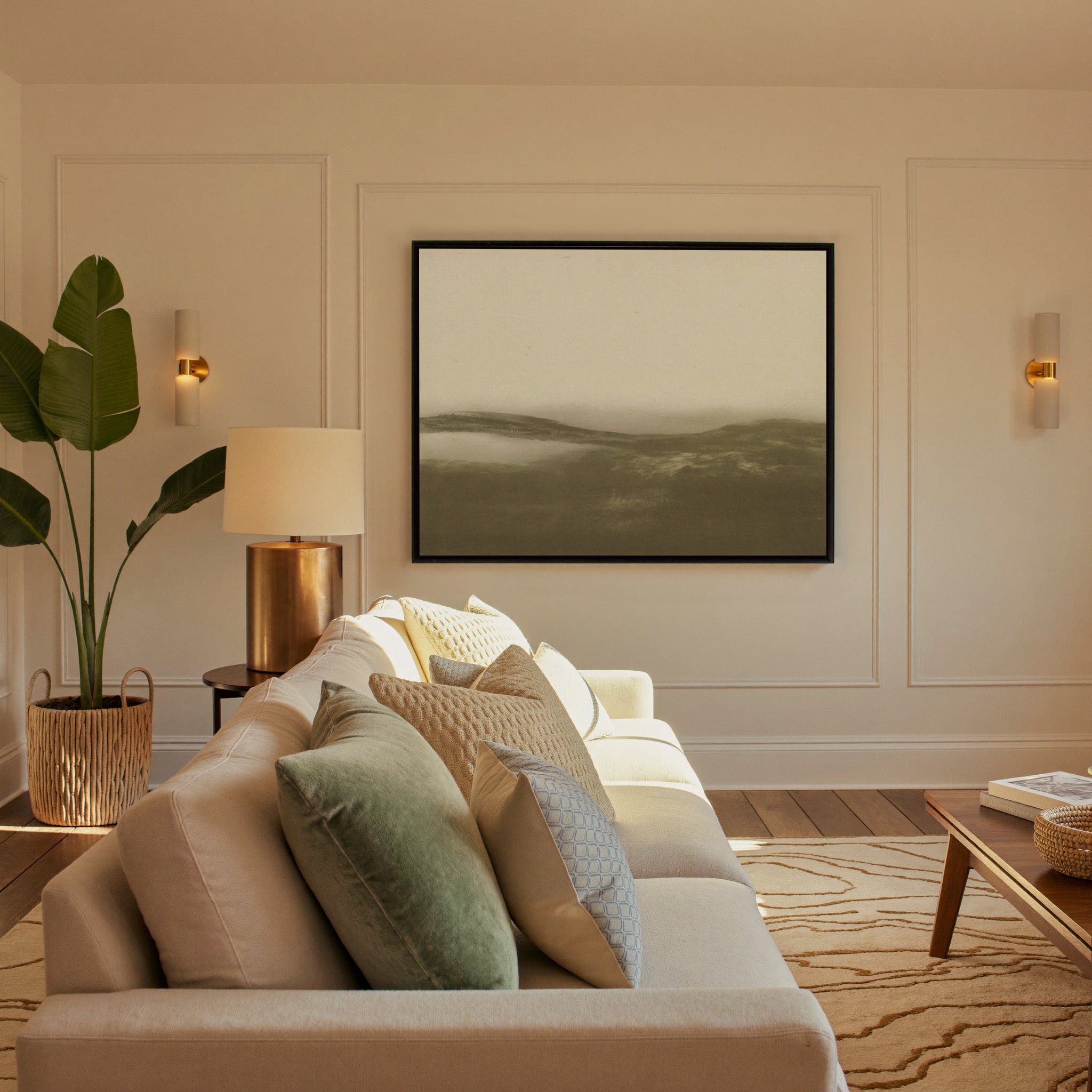 soft sepia mist over low rolling hills canvas wall art in a black frame in a styled room setting