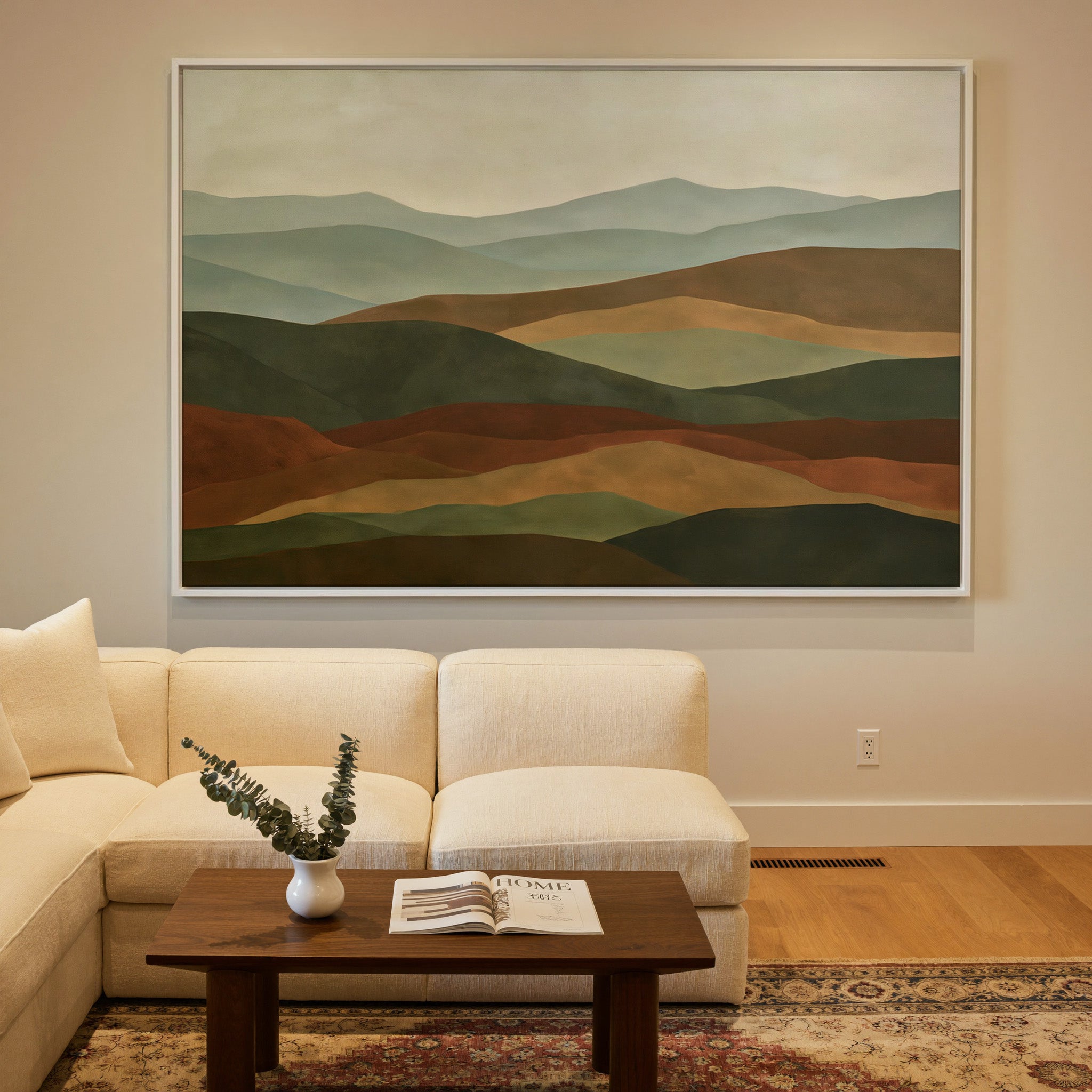 layered hills in sage, olive, rust, and tan canvas wall art in a white frame in a styled room setting