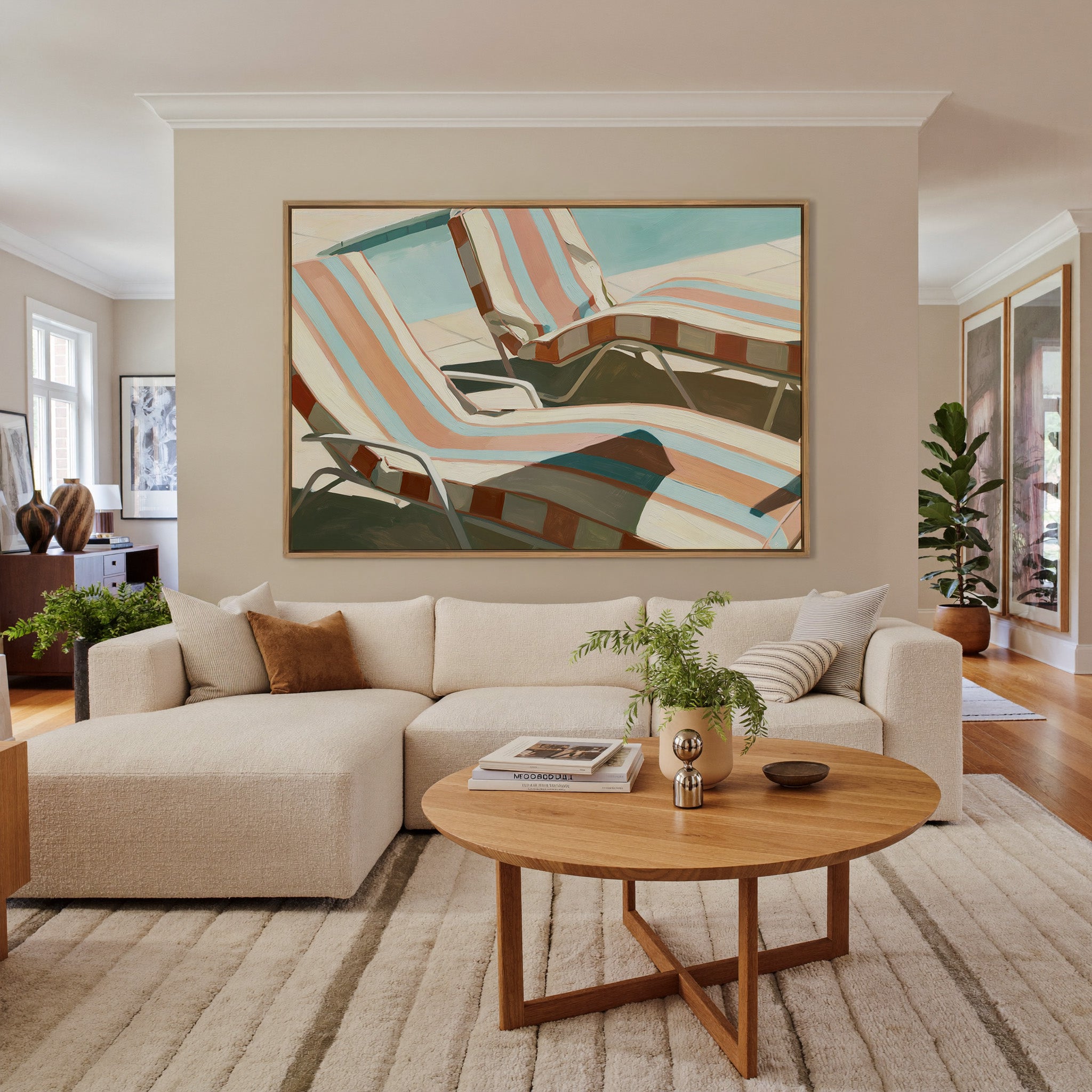 sun faded striped lounge chairs canvas wall art in an oak frame in a living room