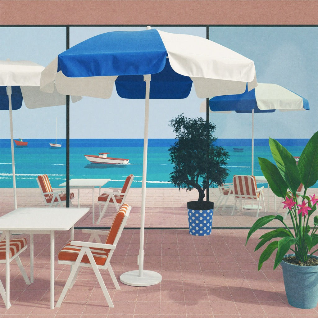 Blue umbrellas, striped chairs, and small boats across a seaside terrace scene