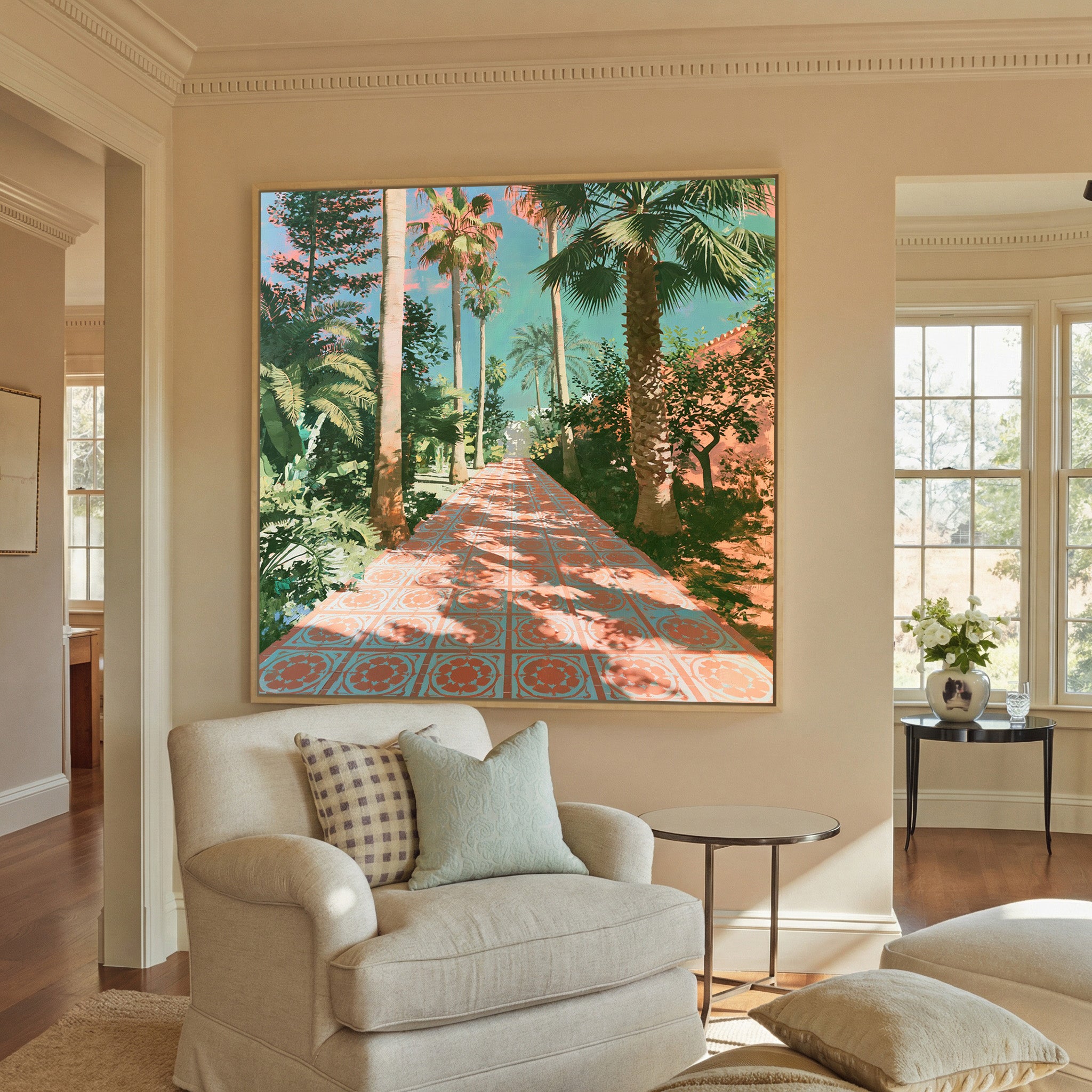tall palms and patterned terracotta paving canvas wall art in a natural wood frame in a styled room setting