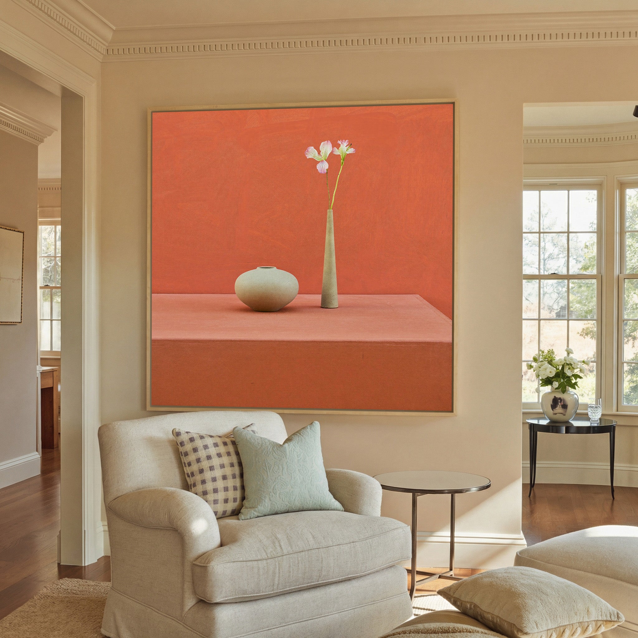 terracotta still life with vase canvas wall art in a natural wood frame in a styled room setting