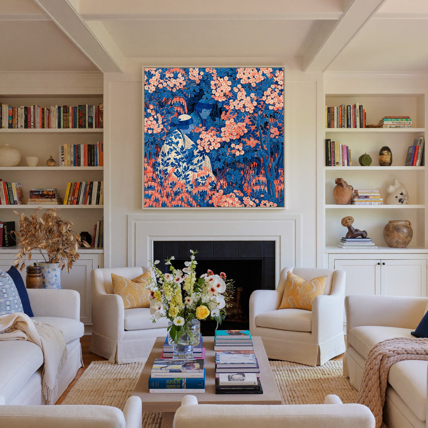 blue and coral garden scene with two seated canvas wall art in a white frame above a fireplace