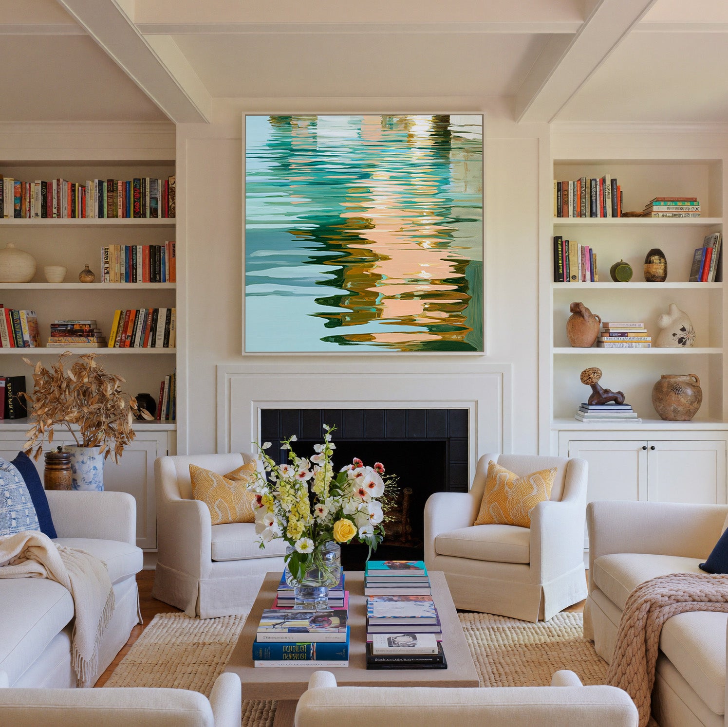 turquoise, peach, and olive abstract with canvas wall art in a white frame above a fireplace