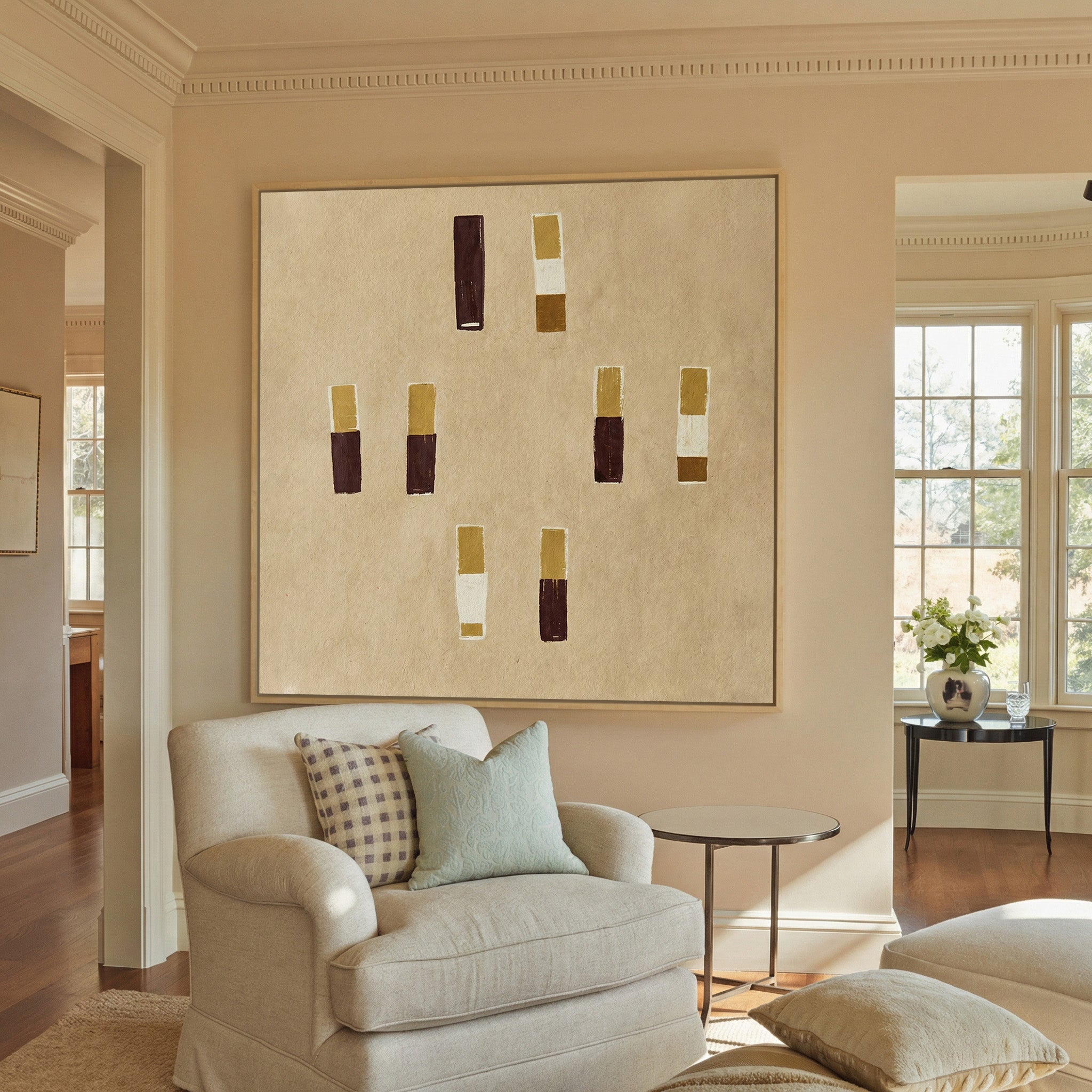 beige abstract with burgundy and ochre blocks canvas wall art in a natural wood frame in a styled room setting