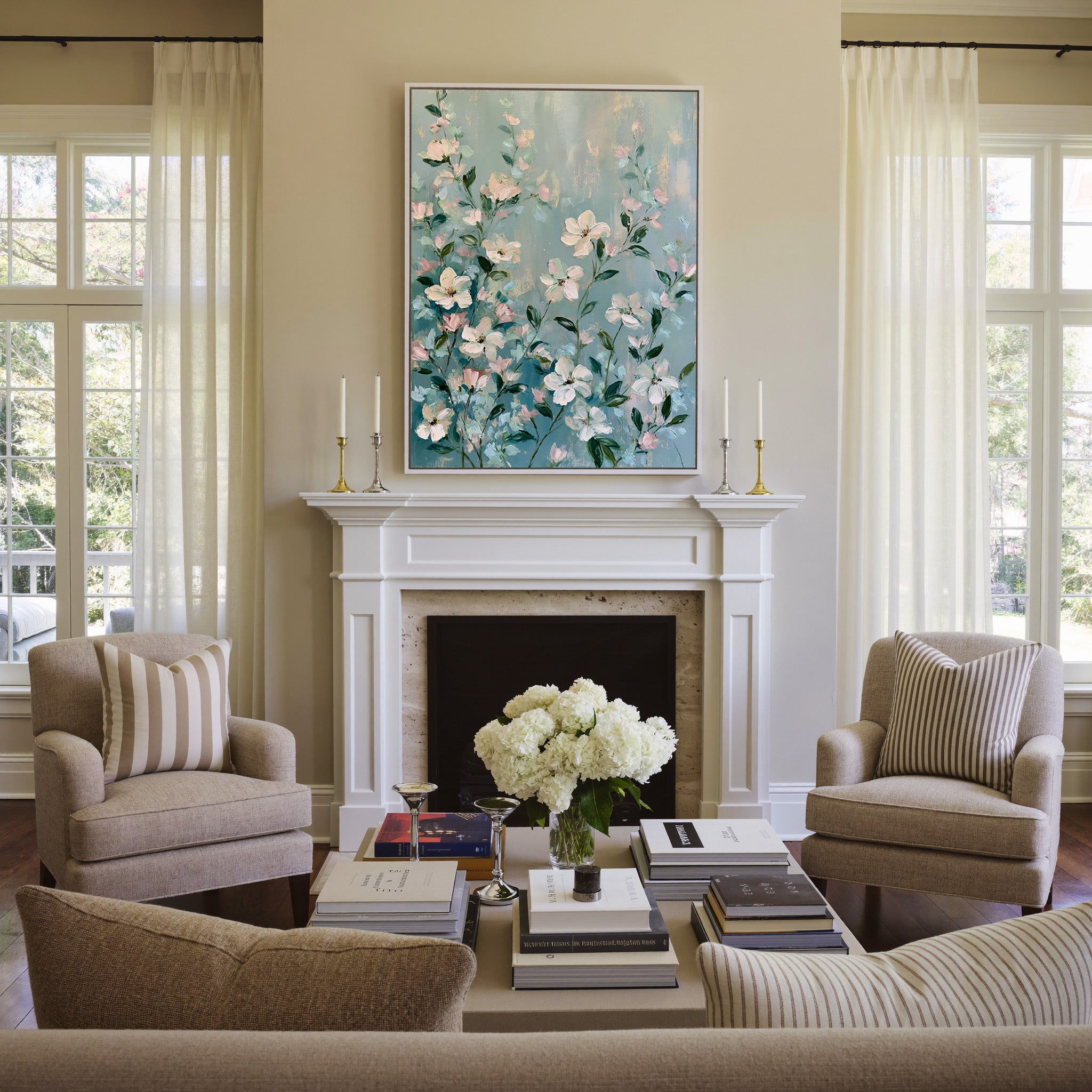 cream, blush, and mint floral garden canvas wall art in a white frame above a mantel