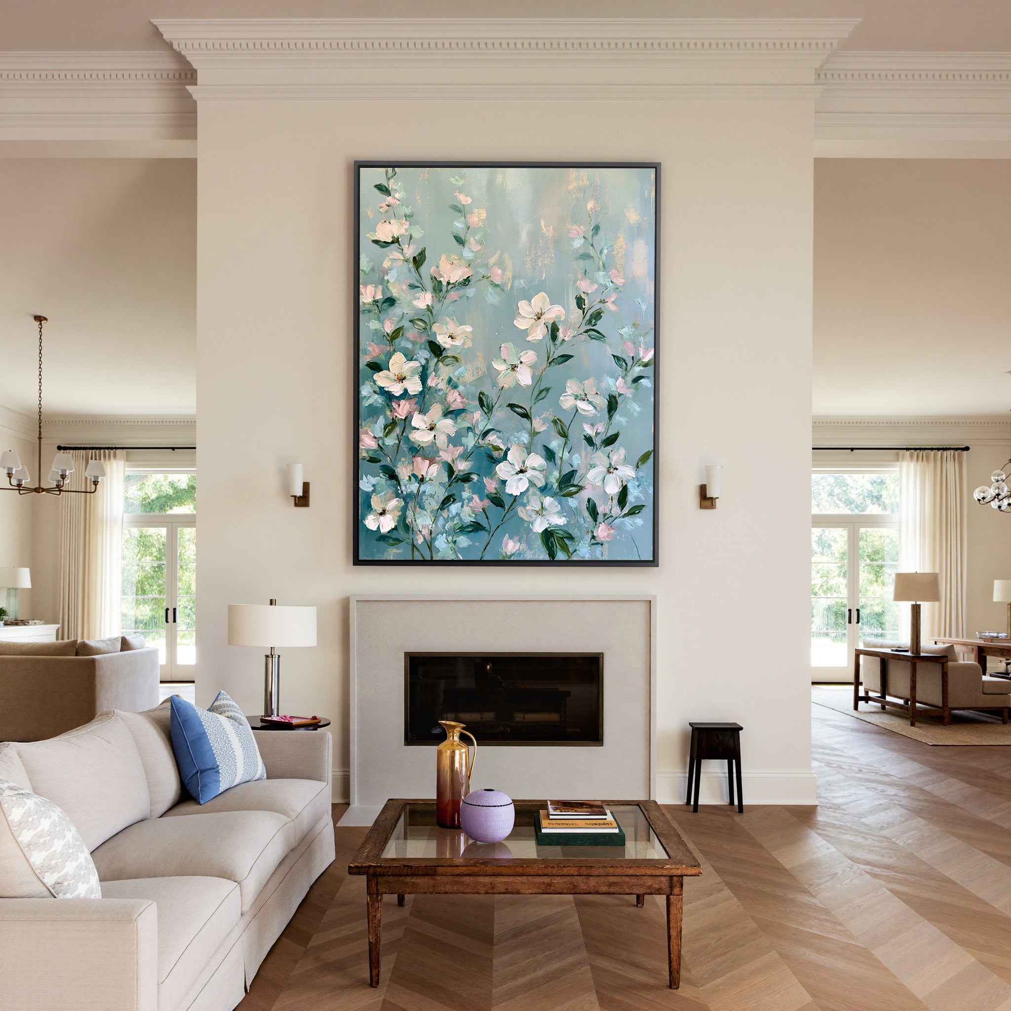 cream, blush, and mint floral garden canvas wall art in a black frame above a mantel