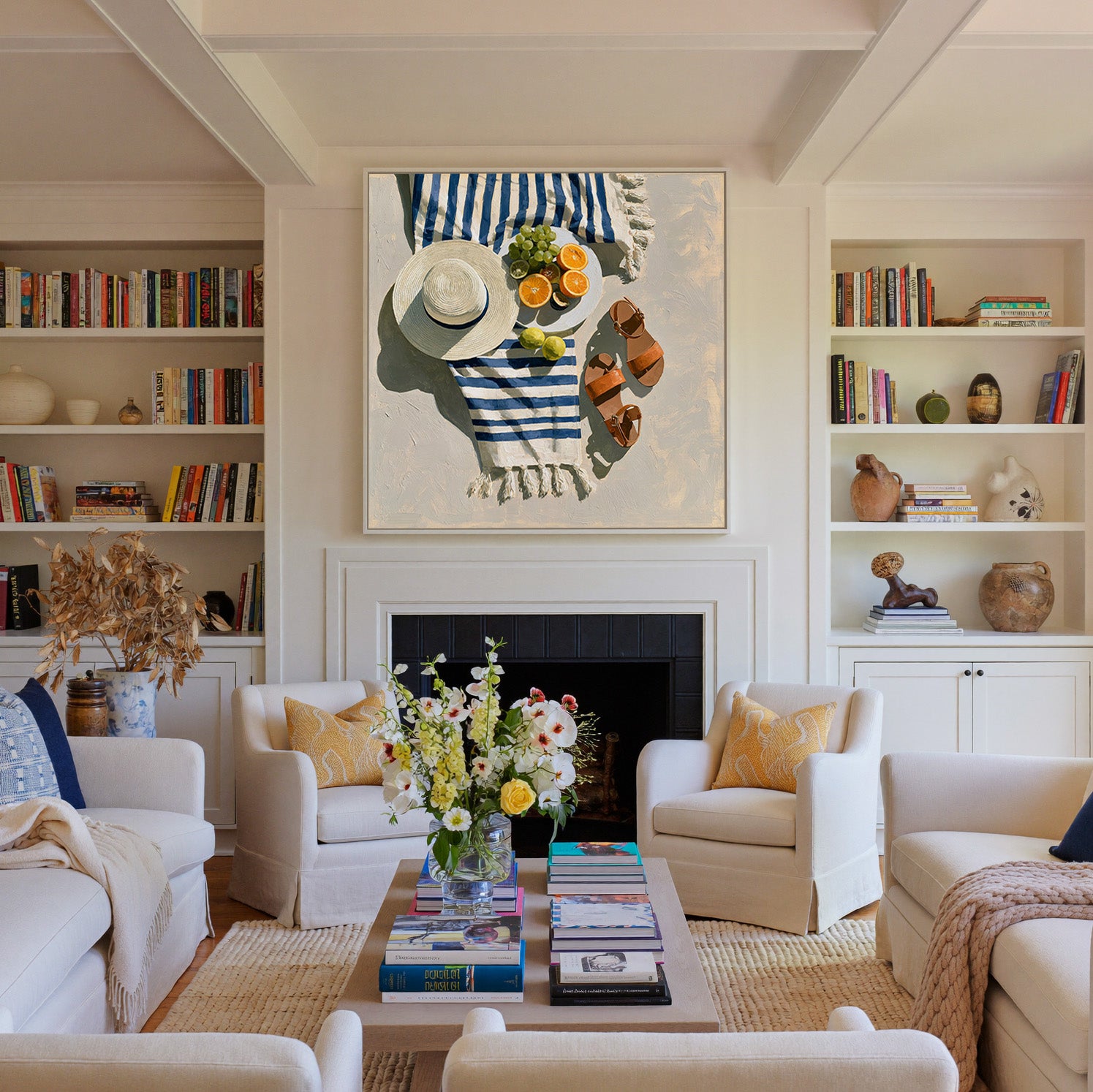 blue striped towel with citrus, hat, and sandals canvas wall art in a white frame above a fireplace