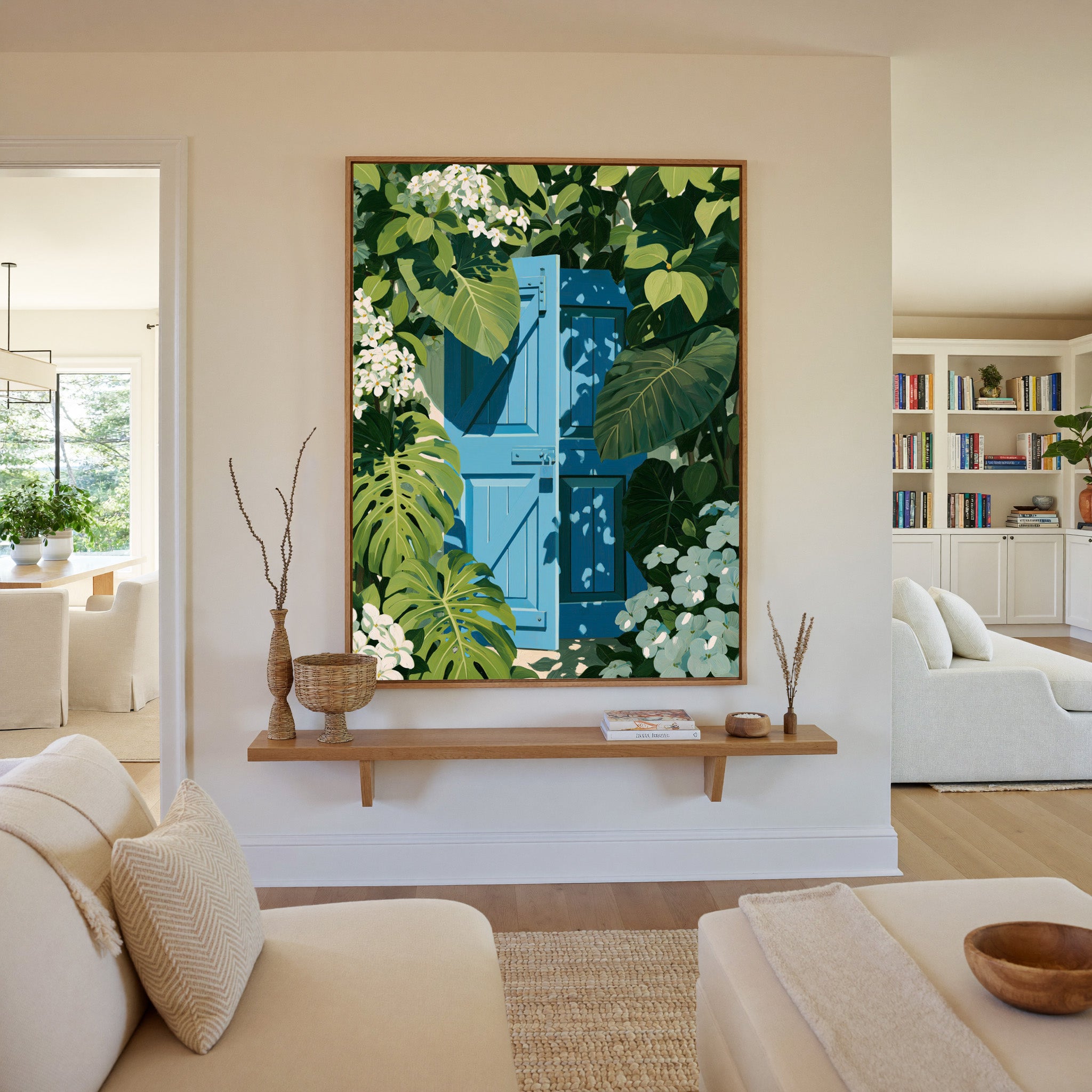 bright blue gate framed by oversized green canvas wall art in an oak frame in a living room