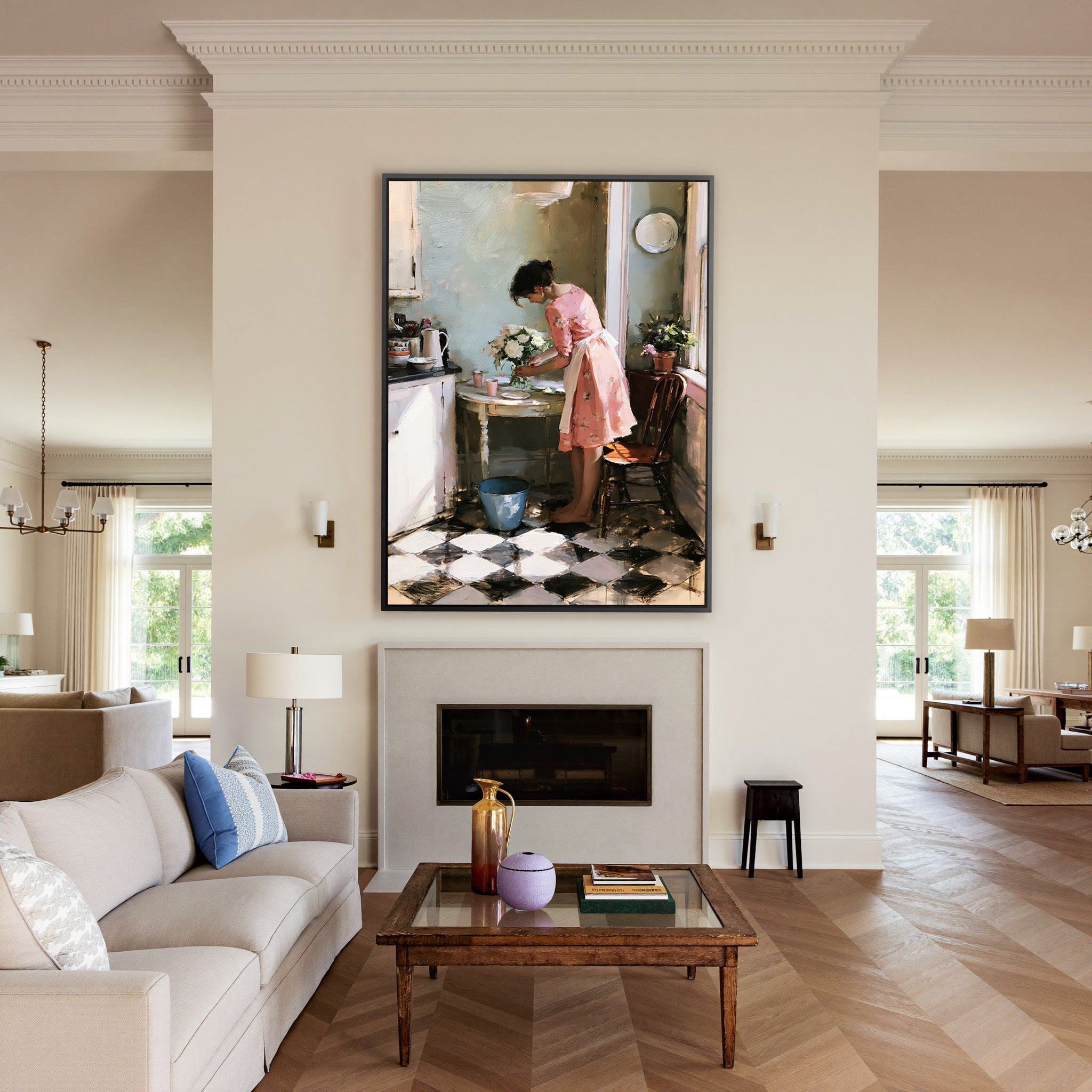 woman in a pink dress arranging white flowers canvas wall art in a black frame above a mantel