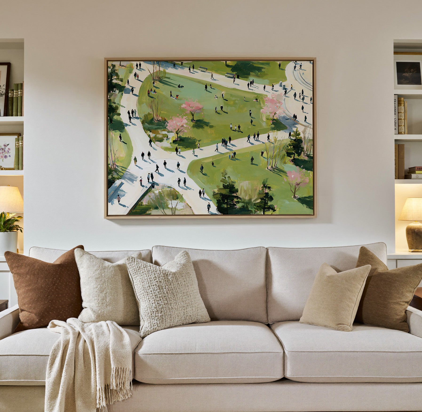 green park with winding paths and scattered canvas wall art in a natural wood frame in a styled room setting