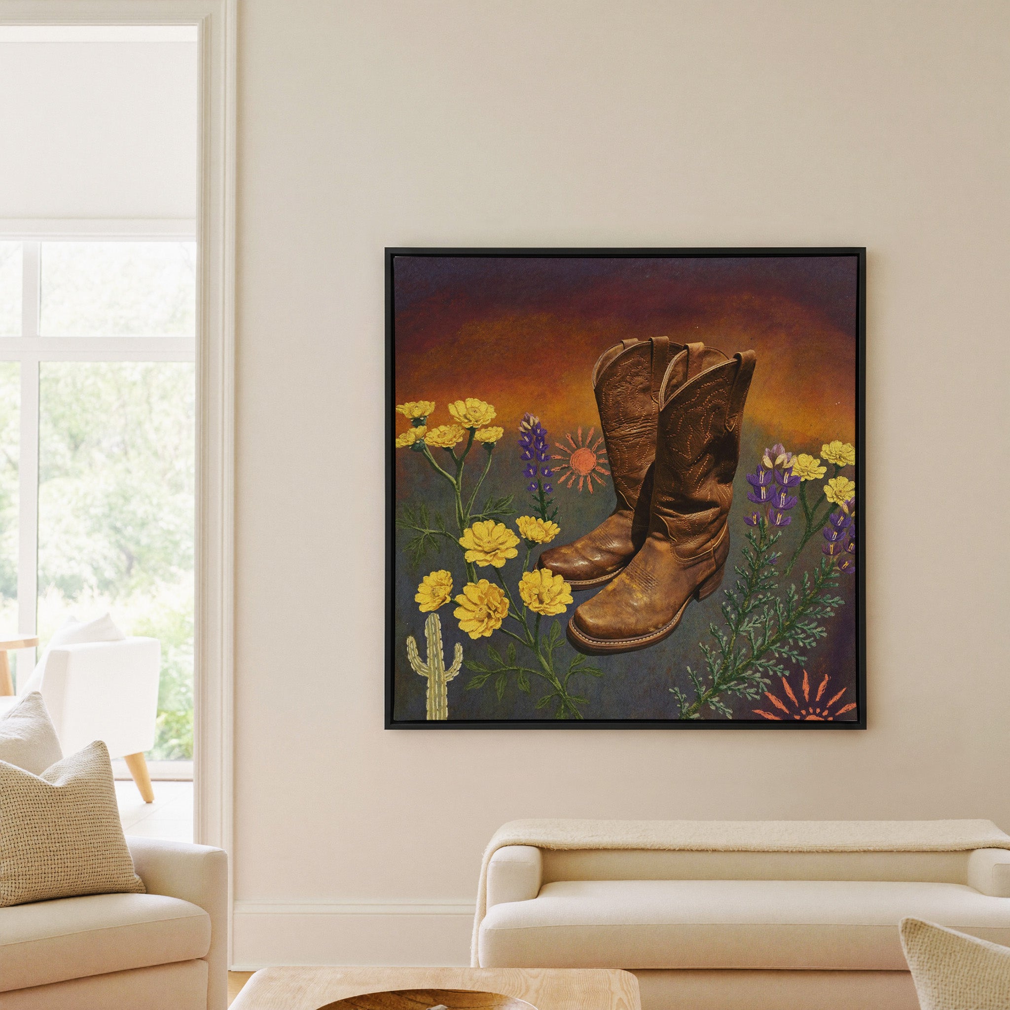 brown boots with yellow and purple wildflowers canvas wall art in a black frame in a living room