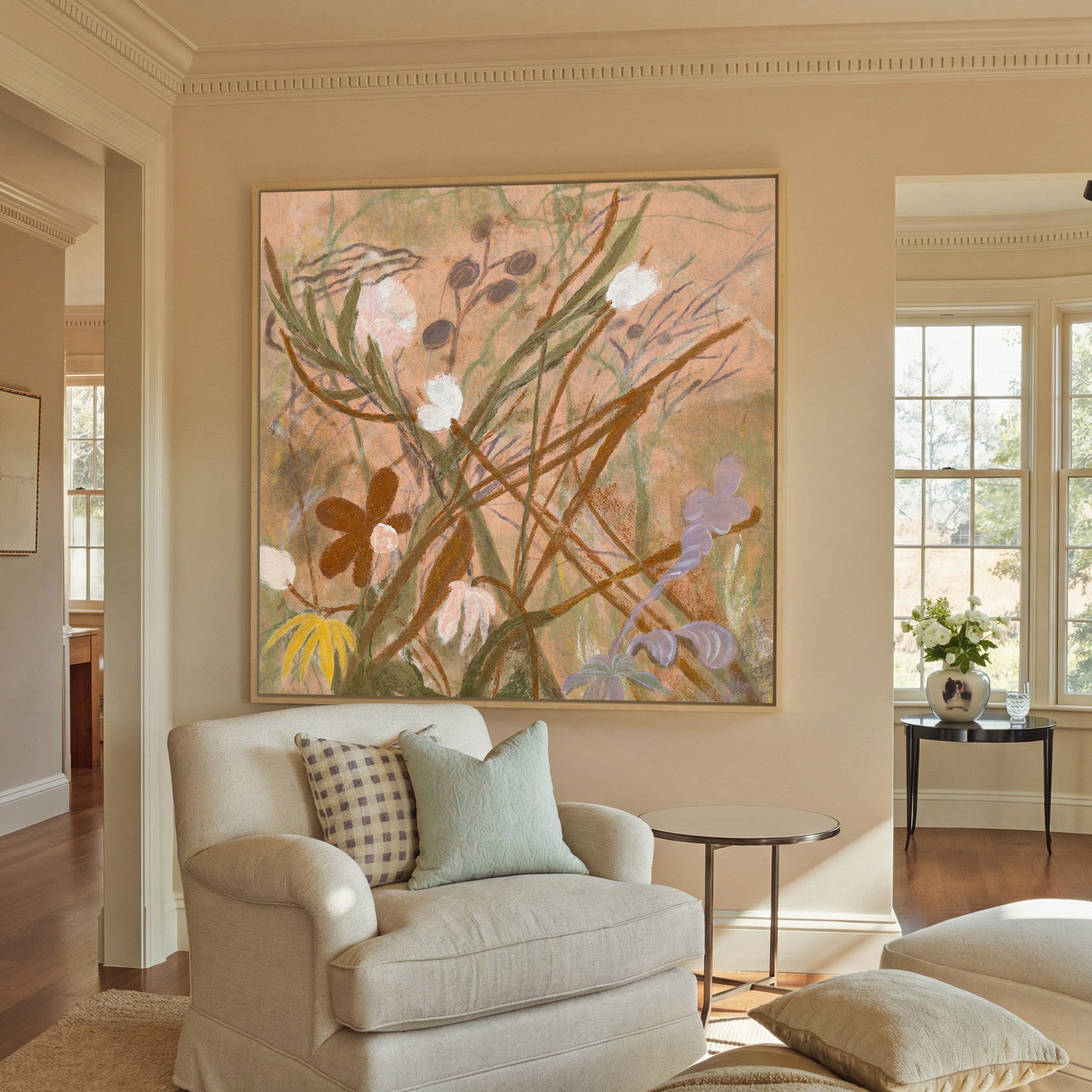 soft botanical meadow with warm canvas wall art in a natural wood frame in a styled room setting