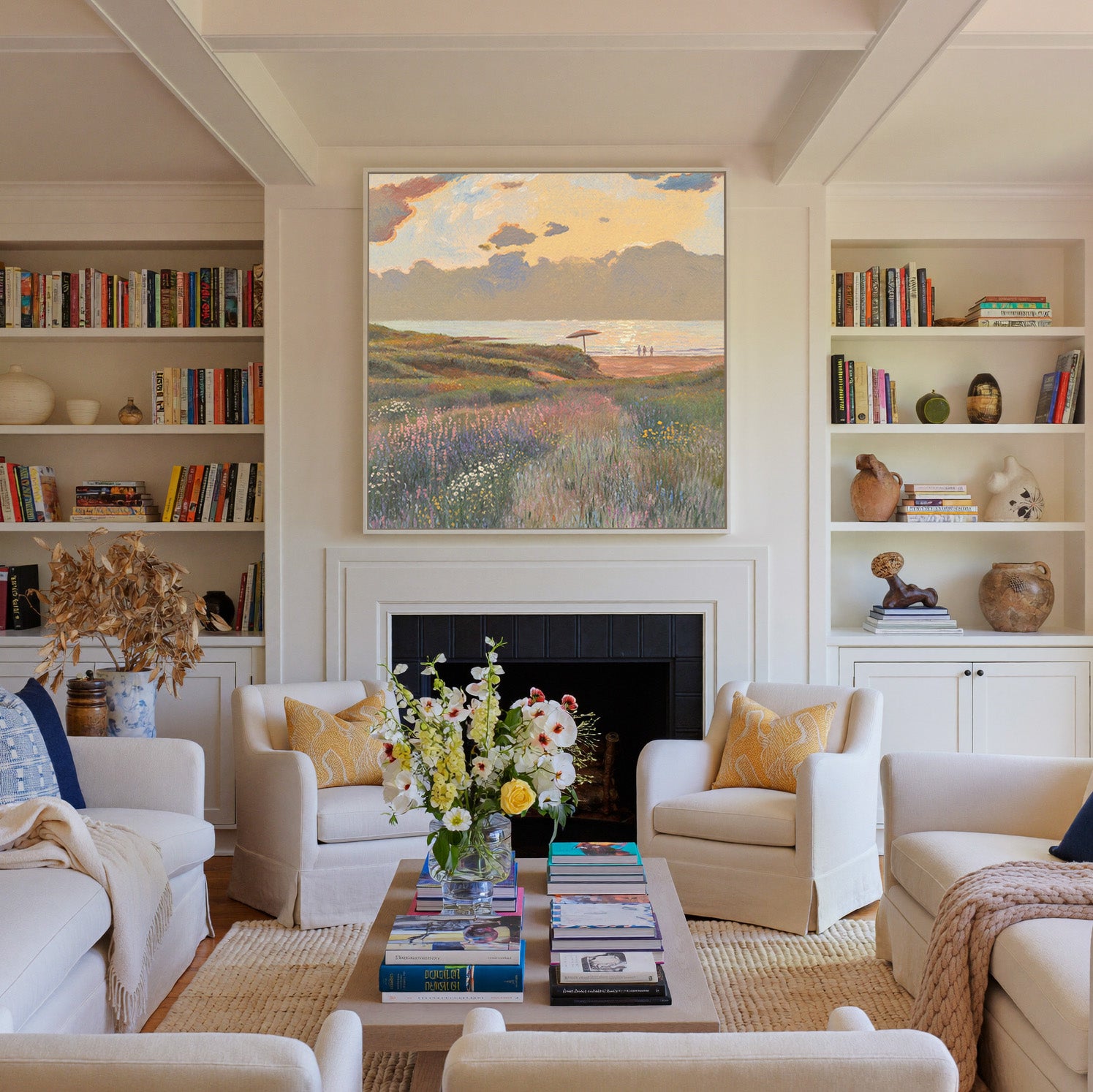 soft coastal meadow with pastel wildflowers and canvas wall art in a white frame above a fireplace