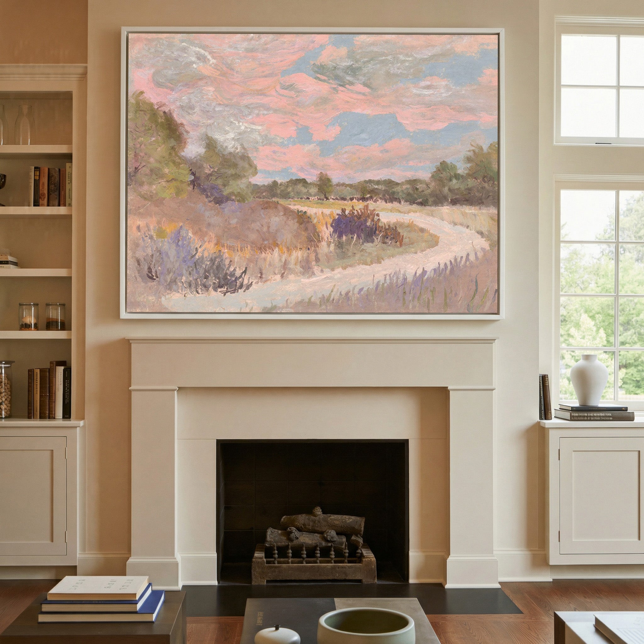 pastel meadow path with pink sky and lavender canvas wall art in a white frame above a mantel