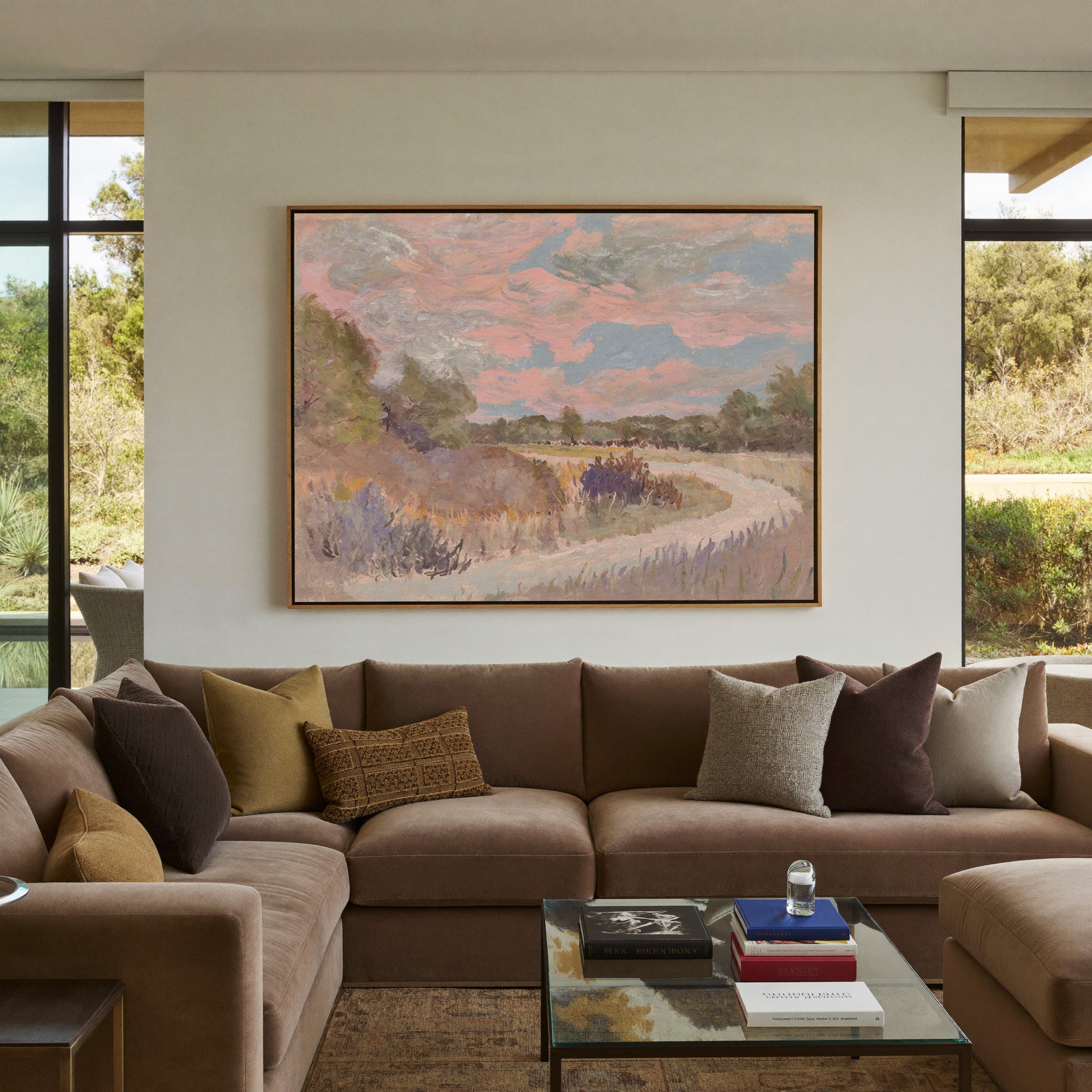 pastel meadow path with pink sky and lavender canvas wall art in an oak frame in a styled room setting