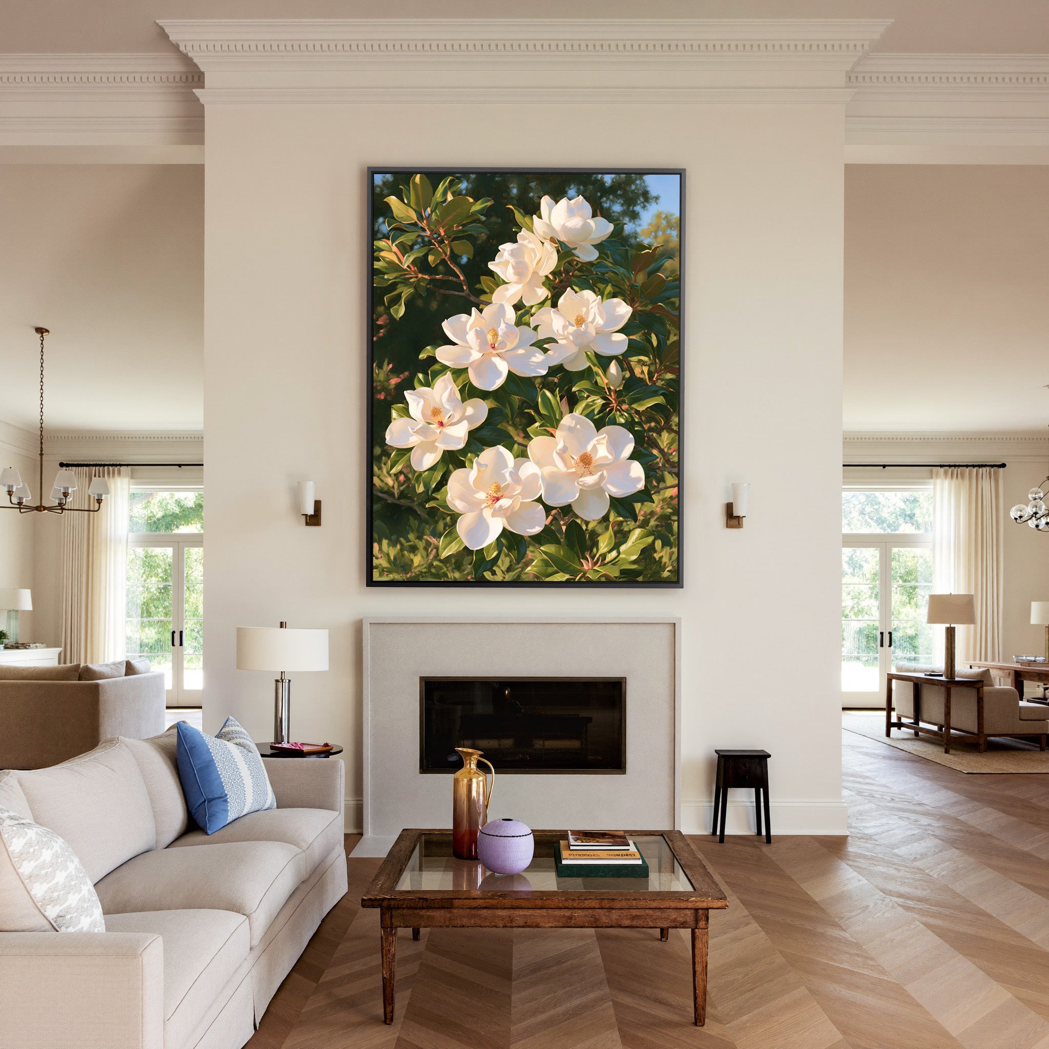 white magnolia blossoms with glossy green canvas wall art in a black frame above a mantel