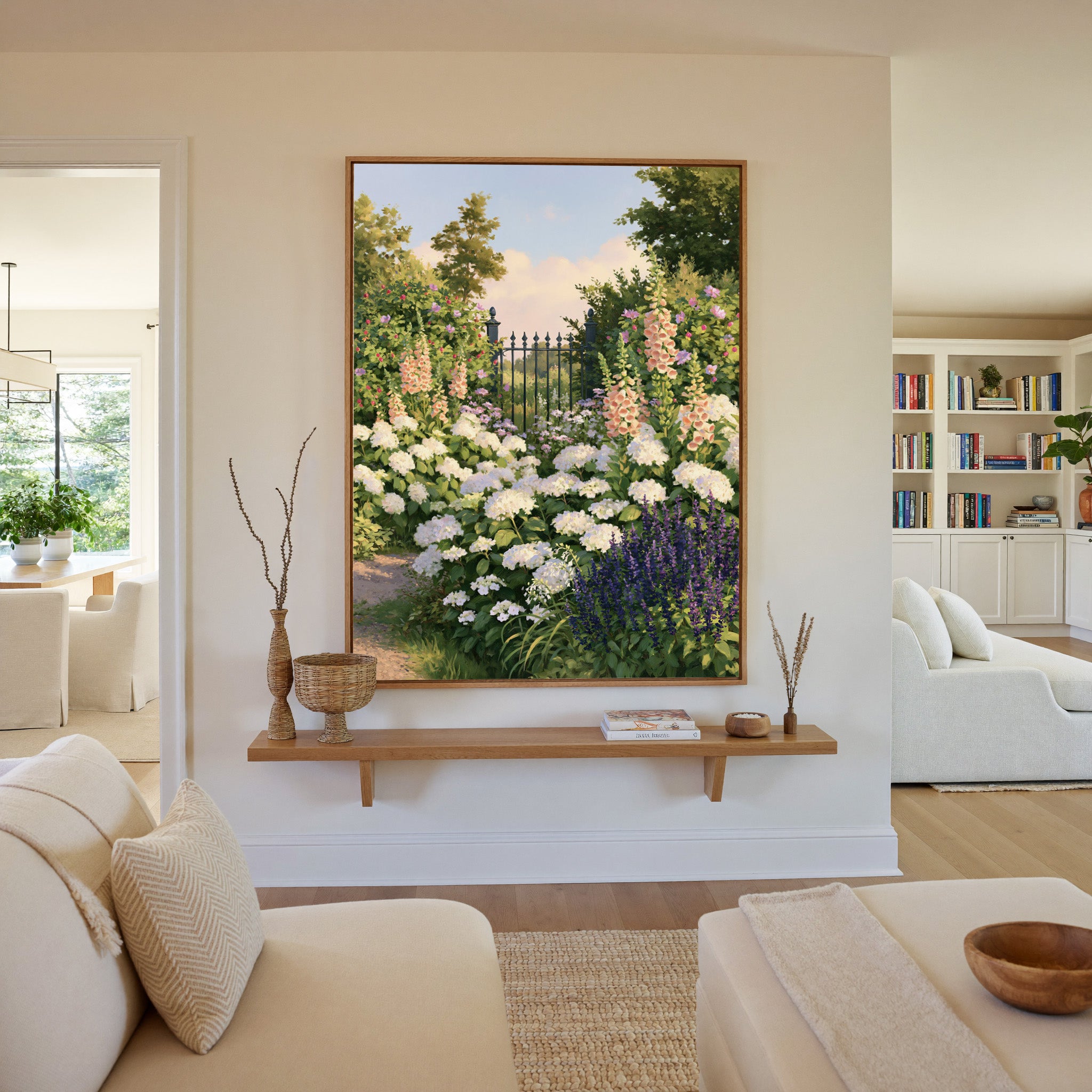 flower filled garden with iron gate and pastel canvas wall art in an oak frame in a living room