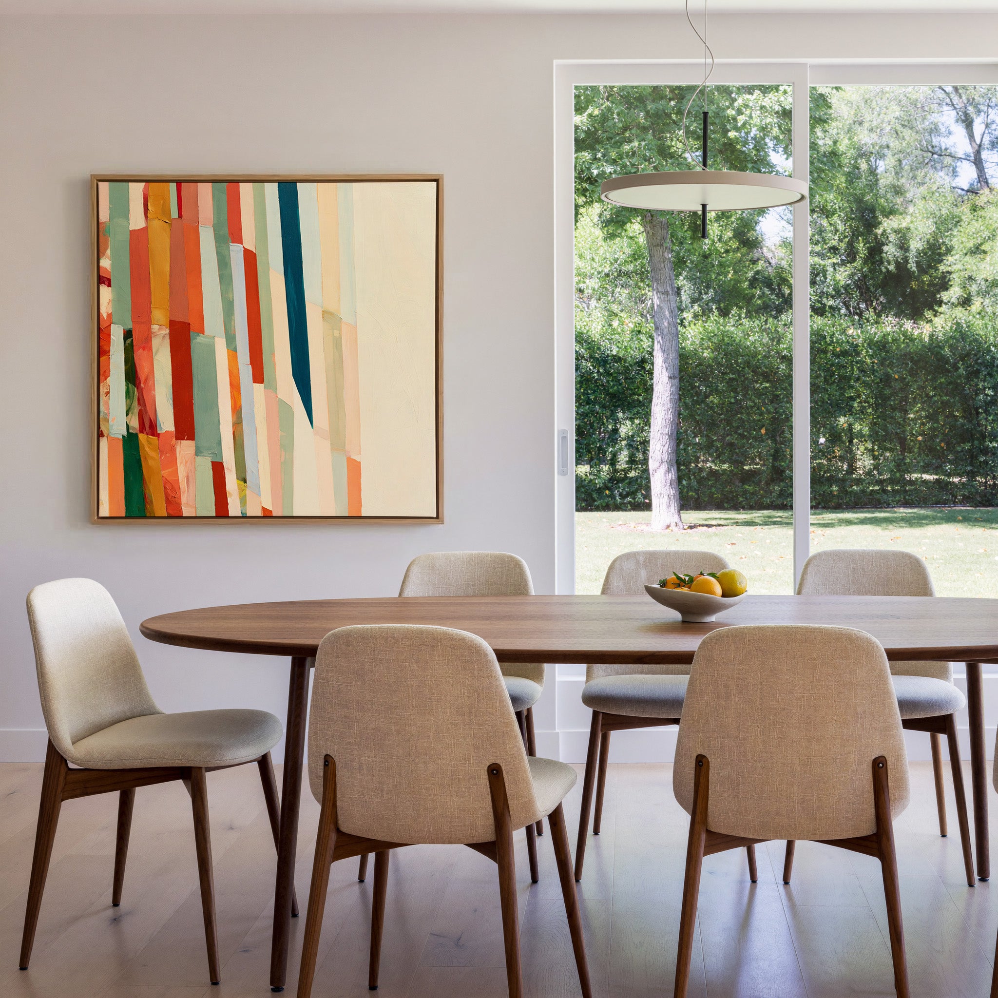 broken grid of vertical color bands canvas wall art in an oak frame in a dining room