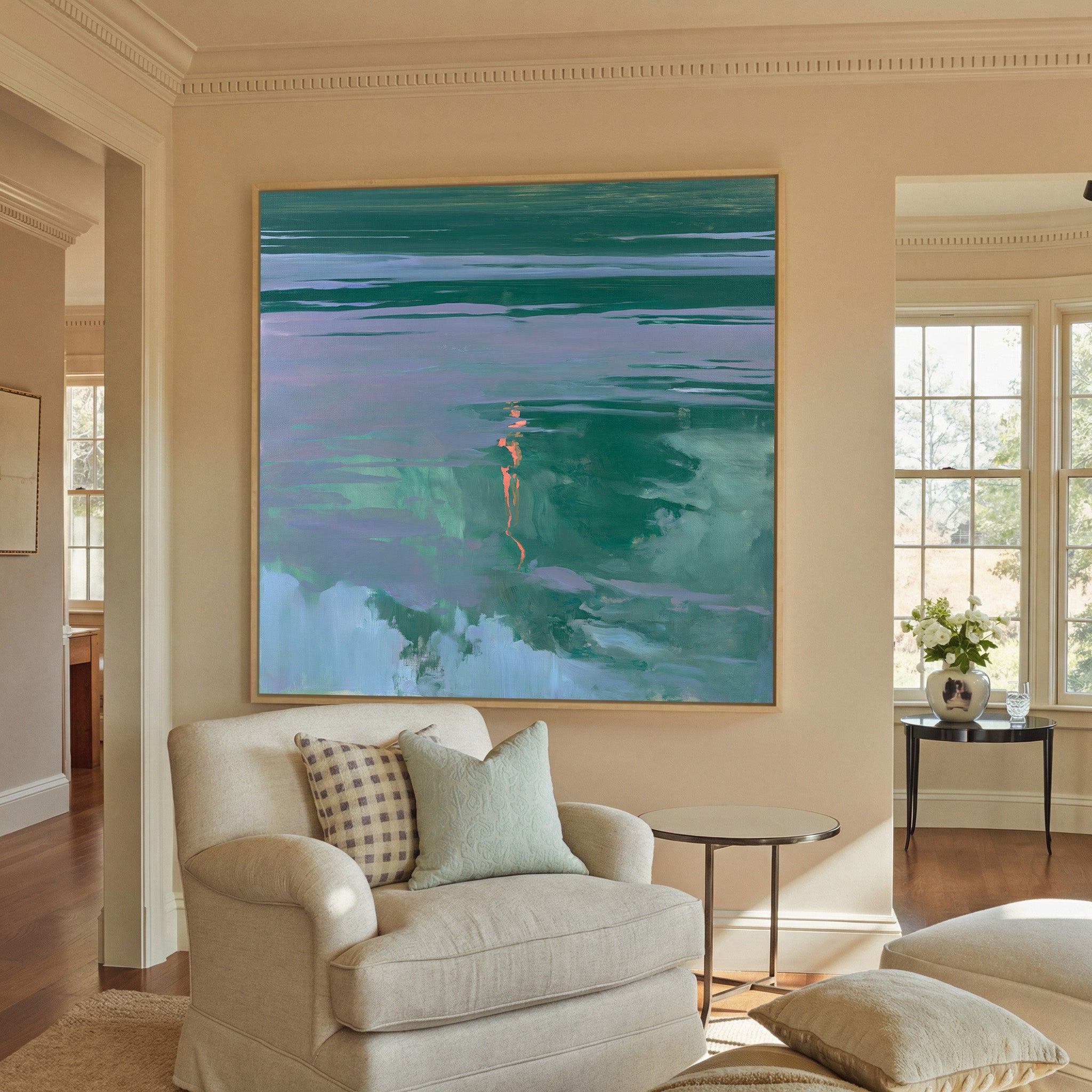 green and lavender abstract with coral canvas wall art in a natural wood frame in a styled room setting