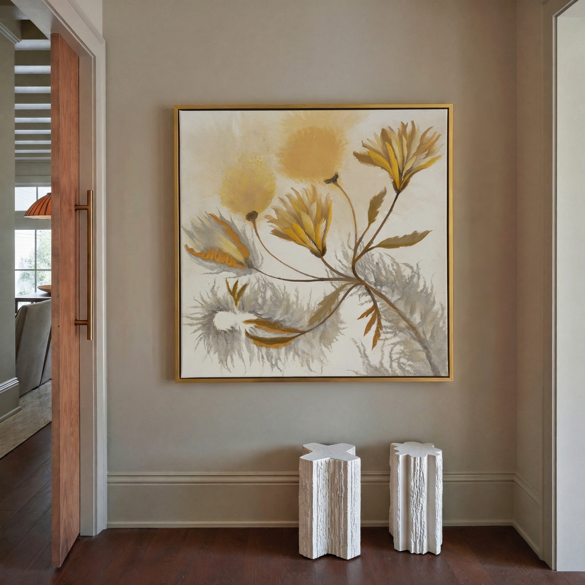 soft ochre and gray abstract canvas wall art in a gold frame in a styled room setting