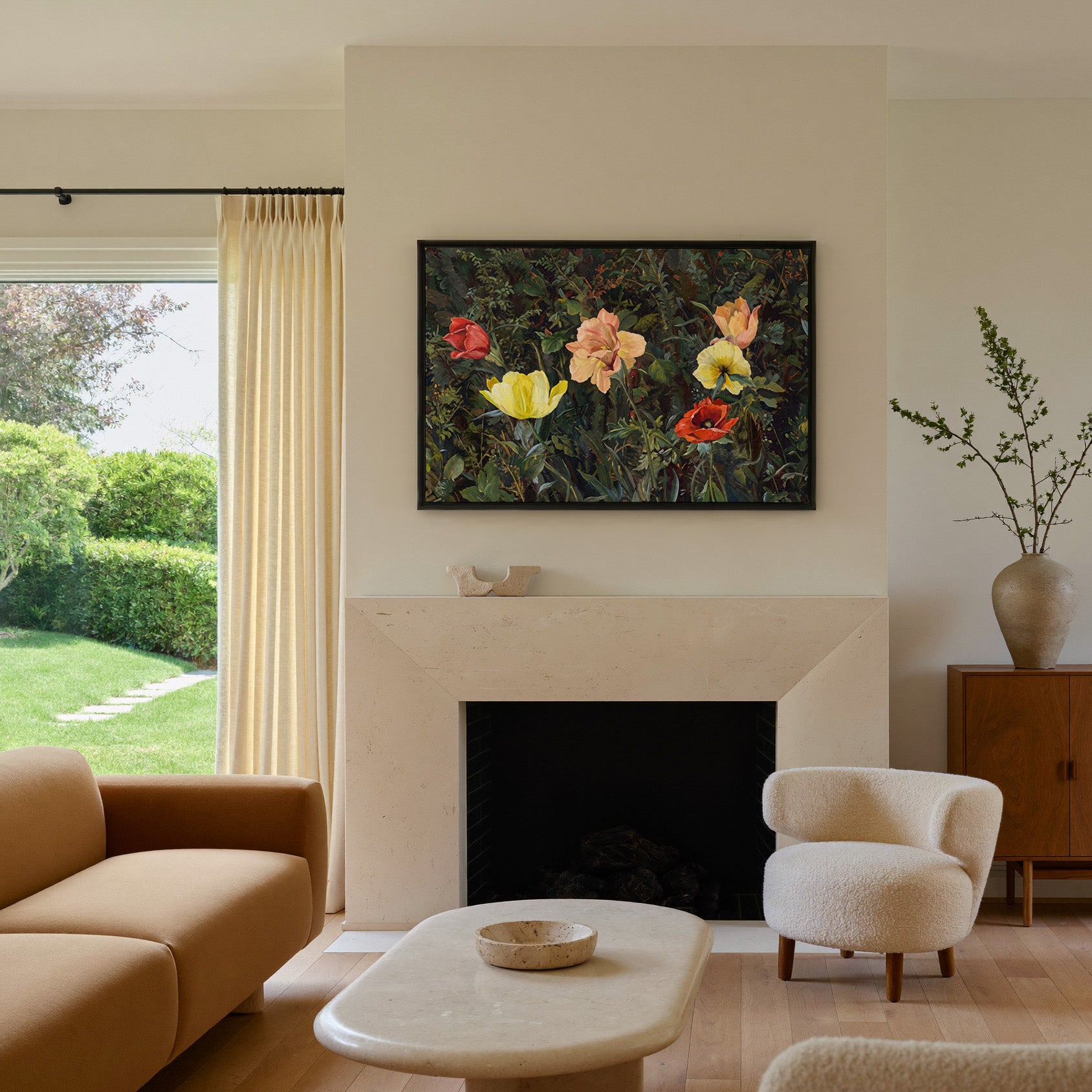 dark foliage with yellow, peach, and red poppies canvas wall art in a black frame above a mantel