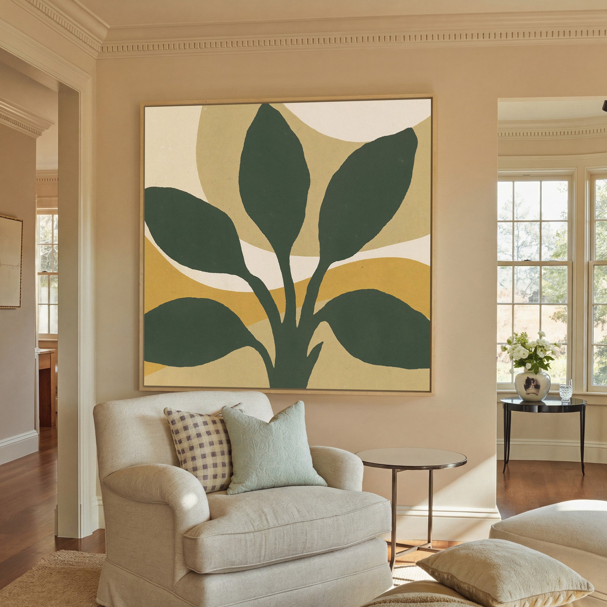 dark green leaf forms with warm ochre arcs canvas wall art in a natural wood frame in a styled room setting
