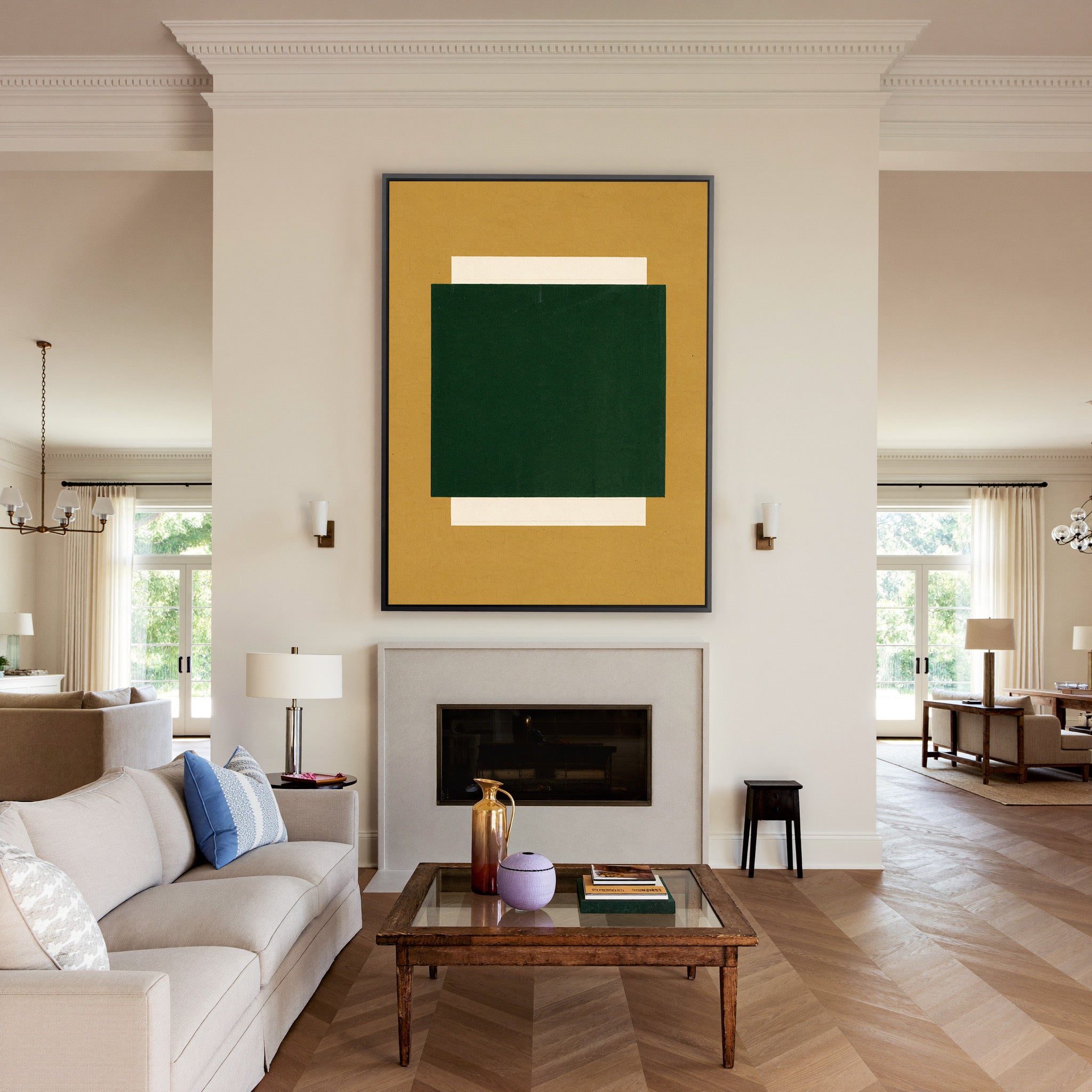 deep green block on ochre ground canvas wall art in a black frame above a mantel