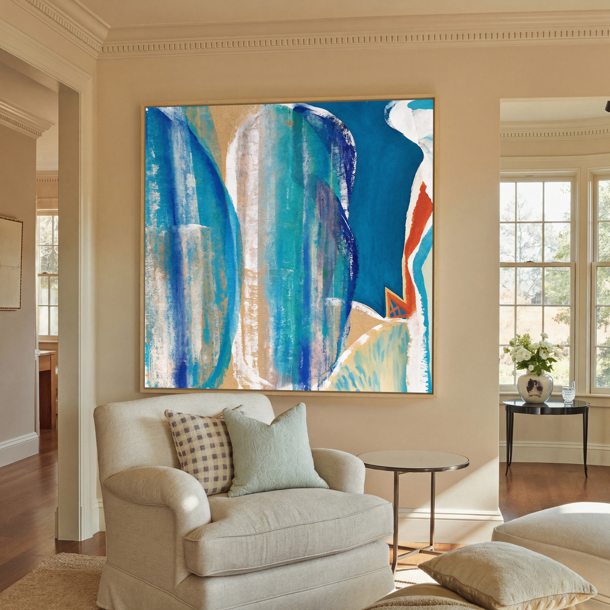blue and turquoise abstract with cream bands canvas wall art in a natural wood frame in a styled room setting