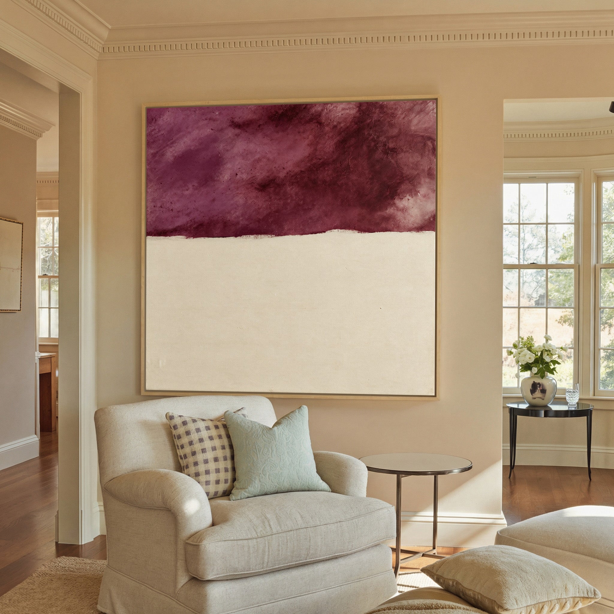 deep plum and cream abstract canvas wall art in a natural wood frame in a styled room setting