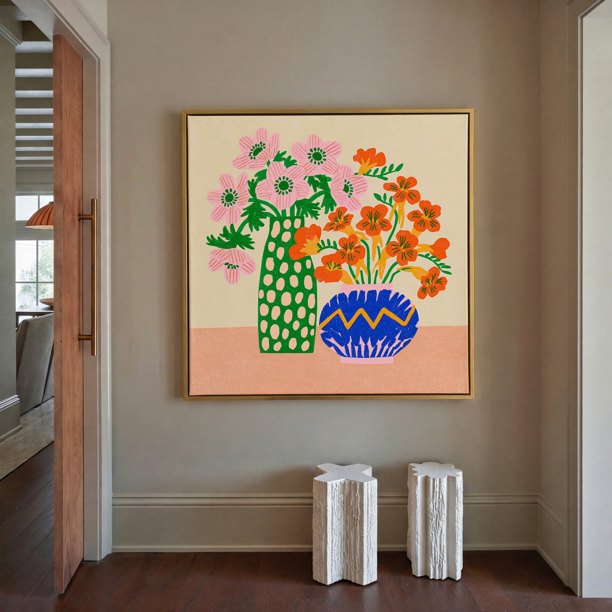 colorful folk still life with pink flowers, canvas wall art in a gold frame in a styled room setting