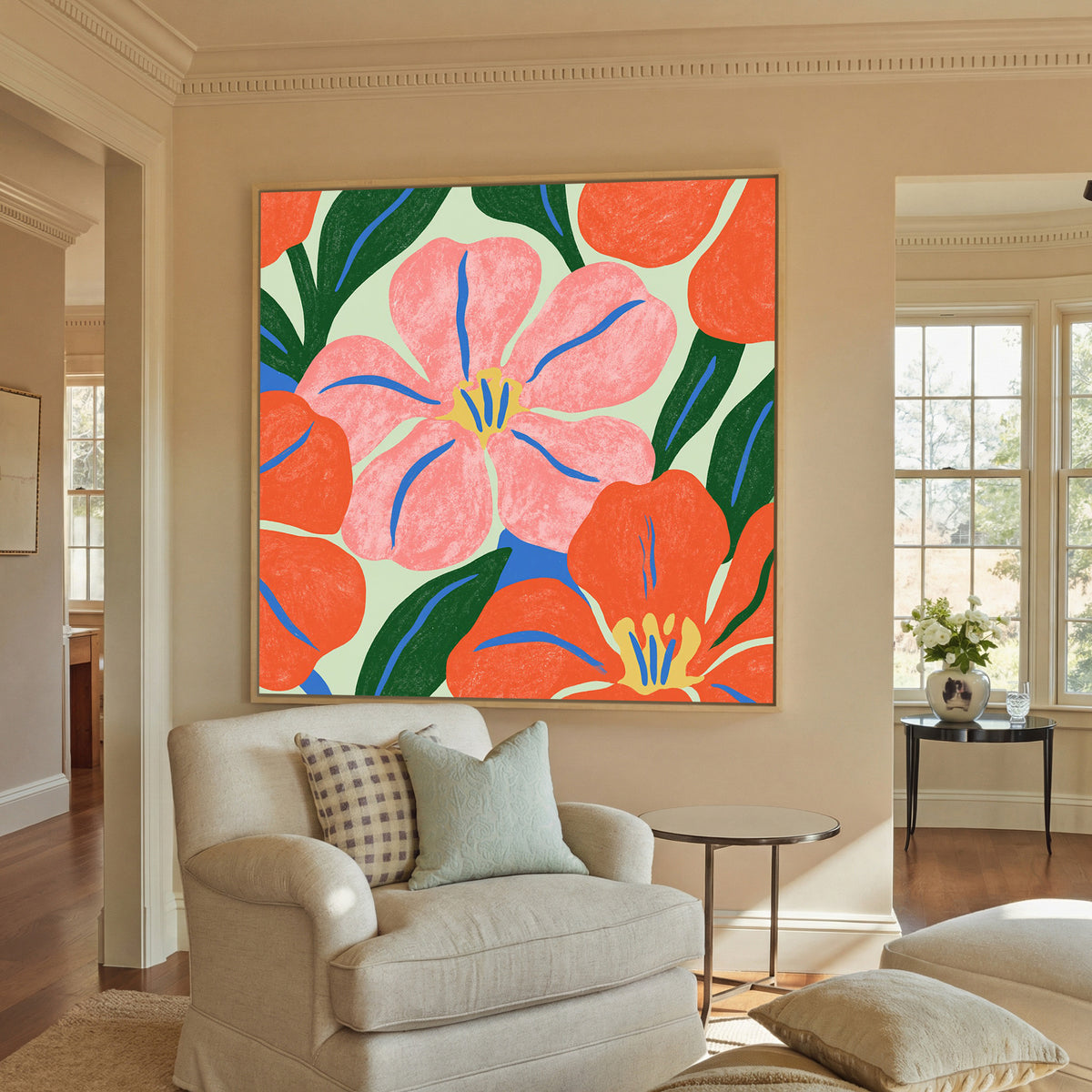 pink and orange floral abstract with blue canvas wall art in a natural wood frame in a styled room setting