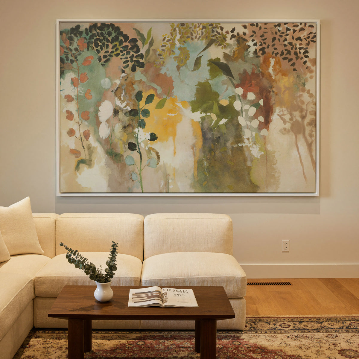 soft botanical abstract with olive, saffron, canvas wall art in a white frame in a styled room setting