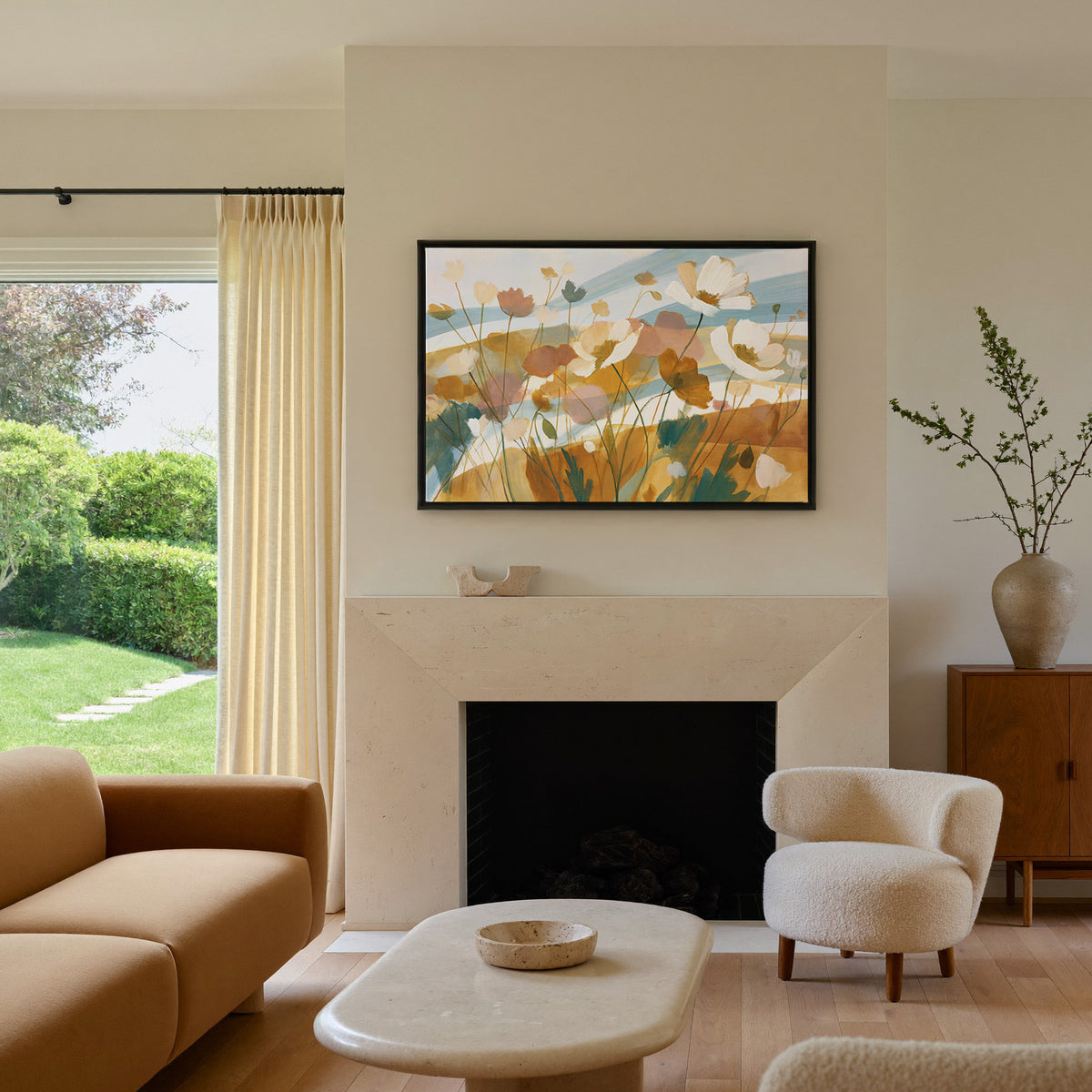 pale apricot poppies with blue bands canvas wall art in a black frame above a mantel