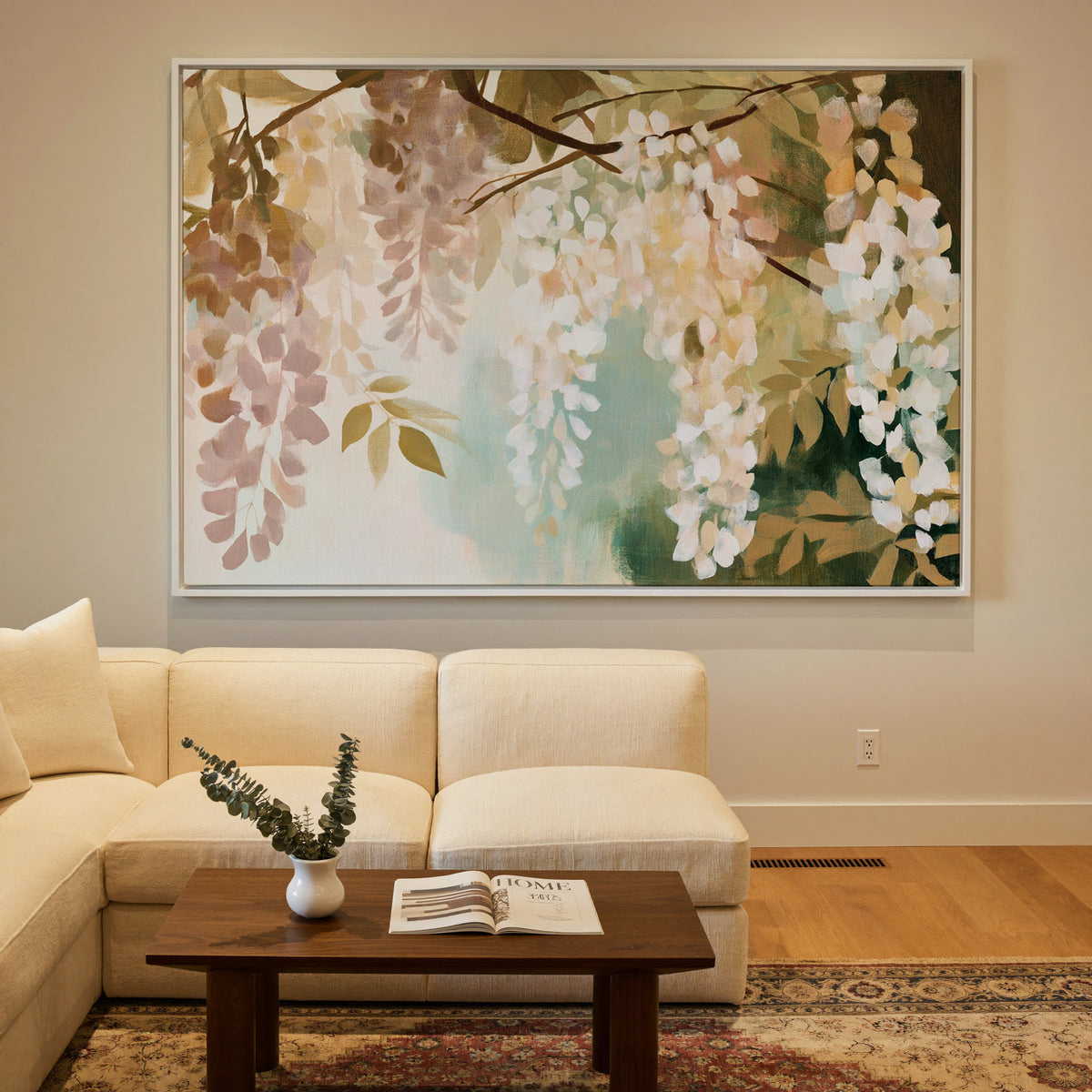 soft hanging wisteria in cream, blush, and sage canvas wall art in a white frame in a styled room setting