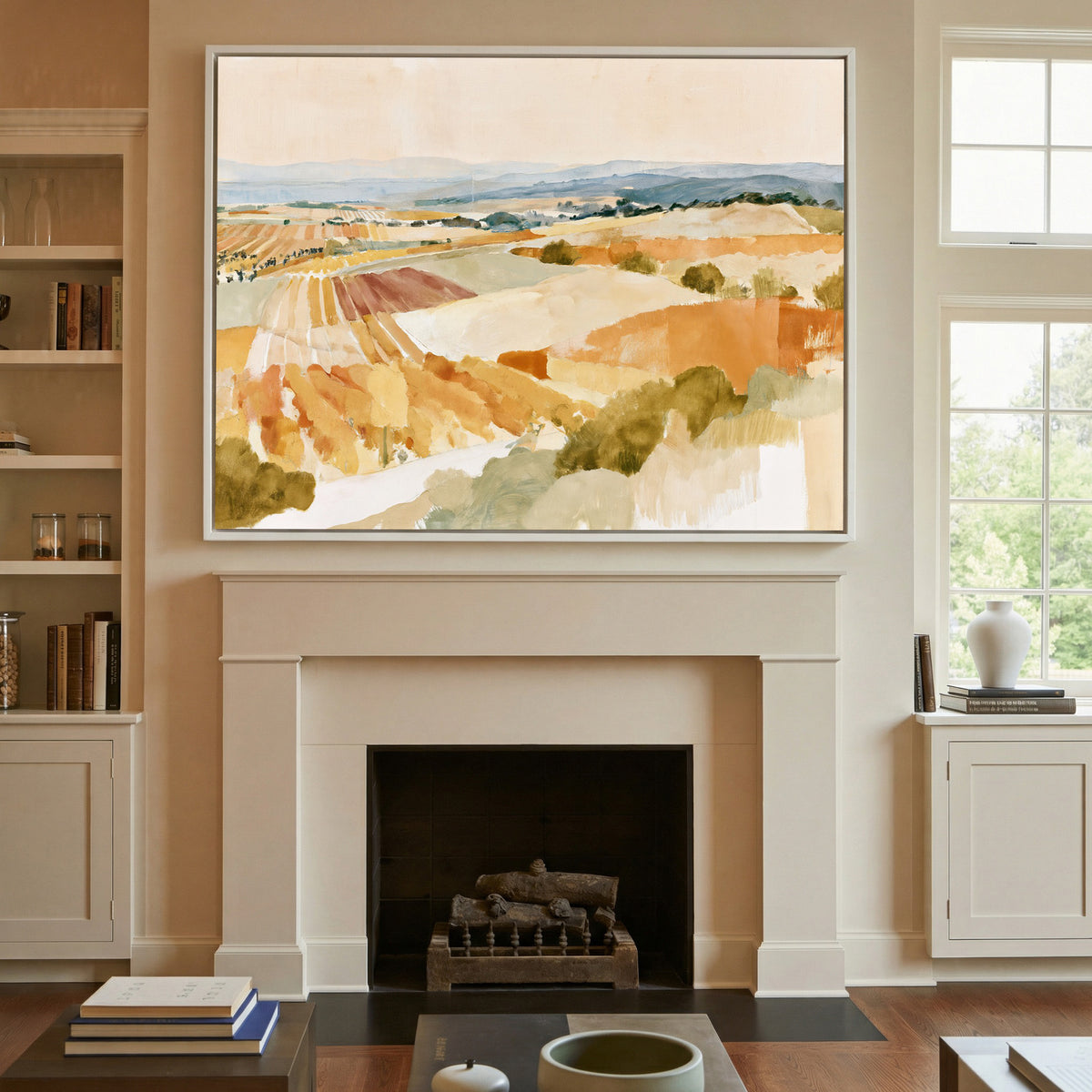 soft vineyard hills in ochre, cream, and blue canvas wall art in a white frame above a mantel
