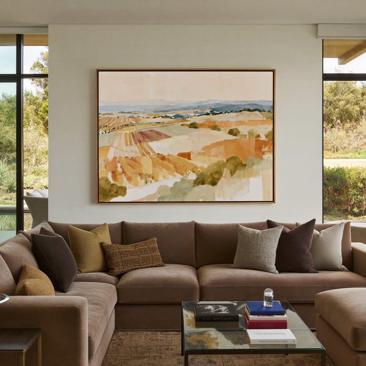 soft vineyard hills in ochre, cream, and blue canvas wall art in an oak frame in a styled room setting
