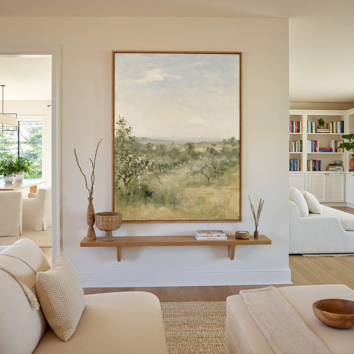 late summer orchard with uneven rows of small canvas wall art in an oak frame in a living room