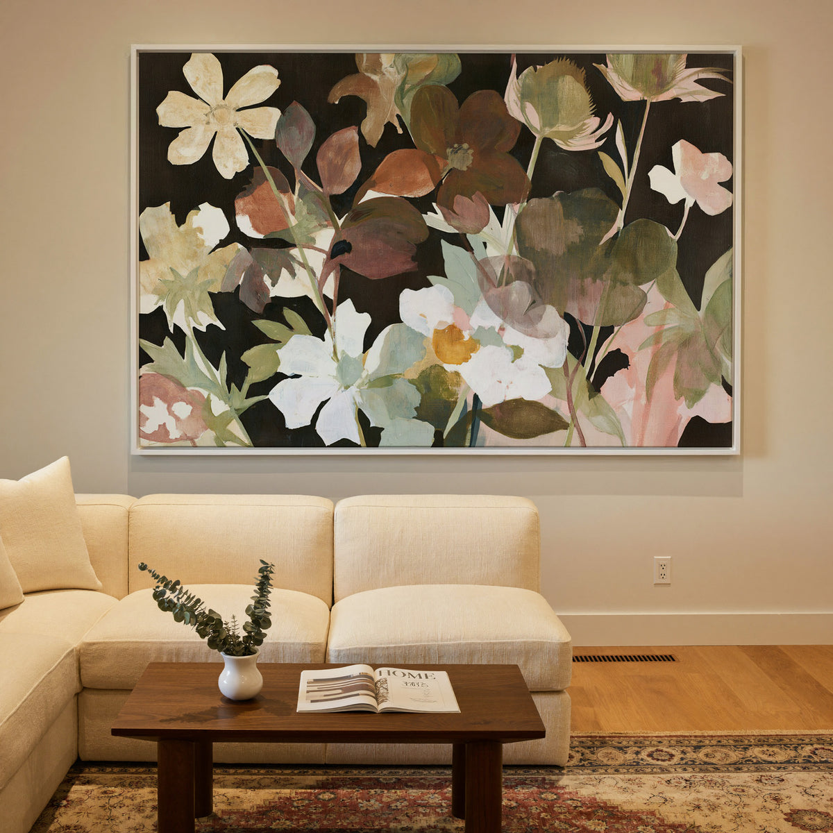 wild meadow flowers on a dark ground canvas wall art in a white frame in a styled room setting