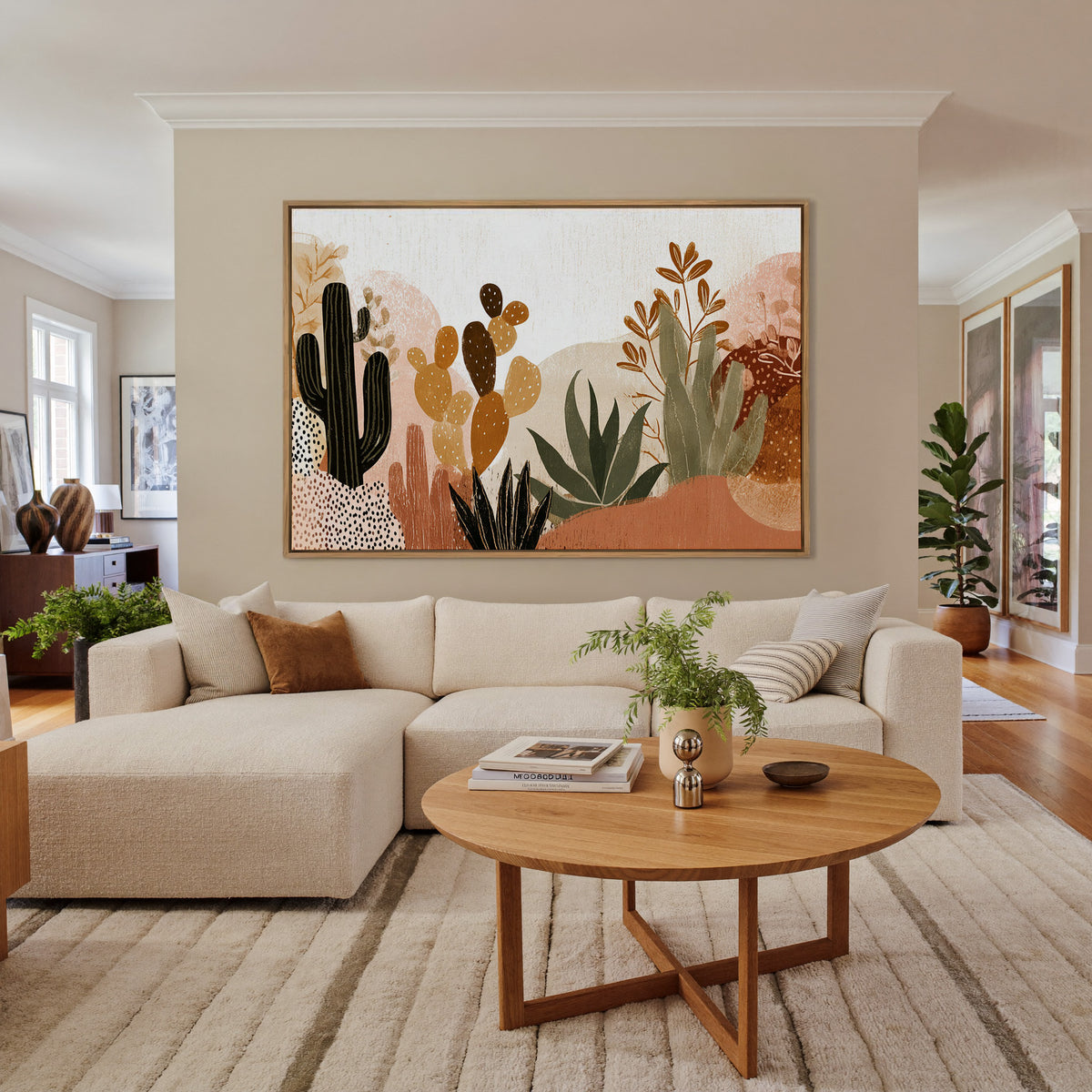 whimsical desert flora with cacti and aloe in canvas wall art in an oak frame in a living room