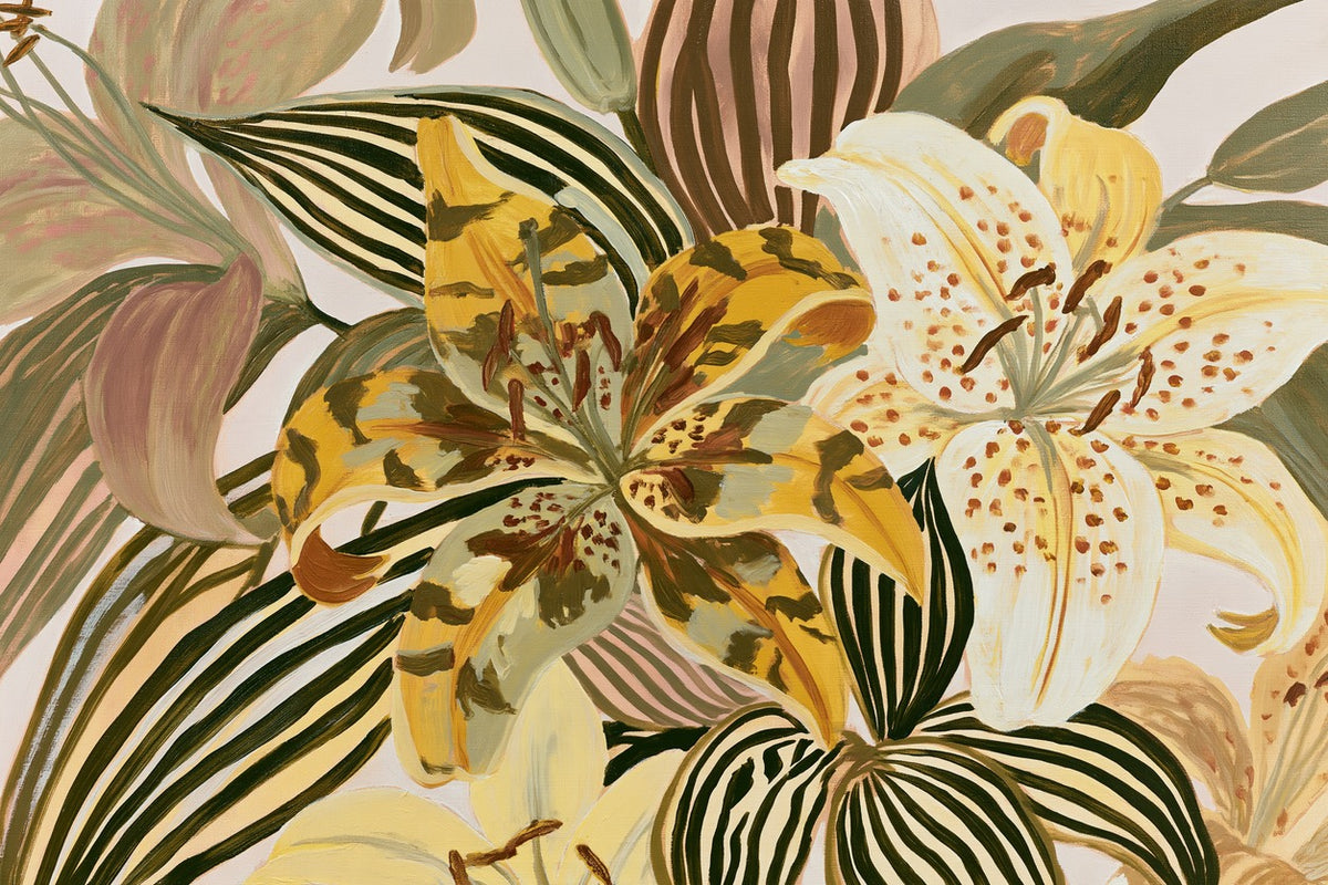 Oversized tiger lilies in yellow and cream overlap dark green striped leaves and muted pink foliage