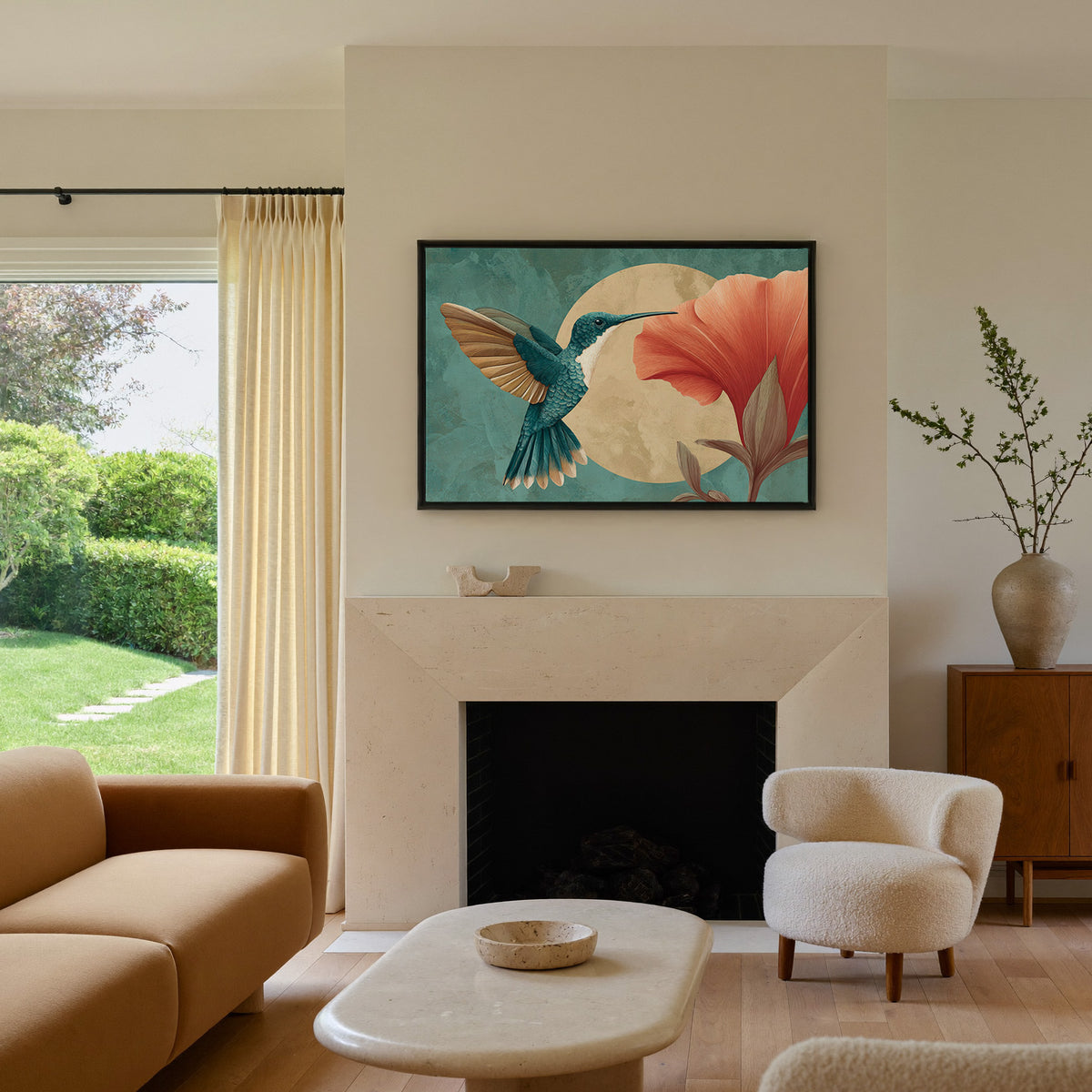 teal hummingbird beside an oversized coral canvas wall art in a black floater frame above a mantel