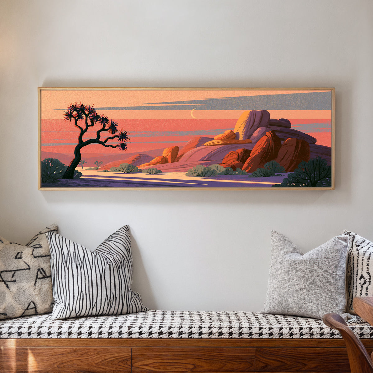 twisted joshua tree beside purple and orange canvas wall art in a natural floater frame in a living room