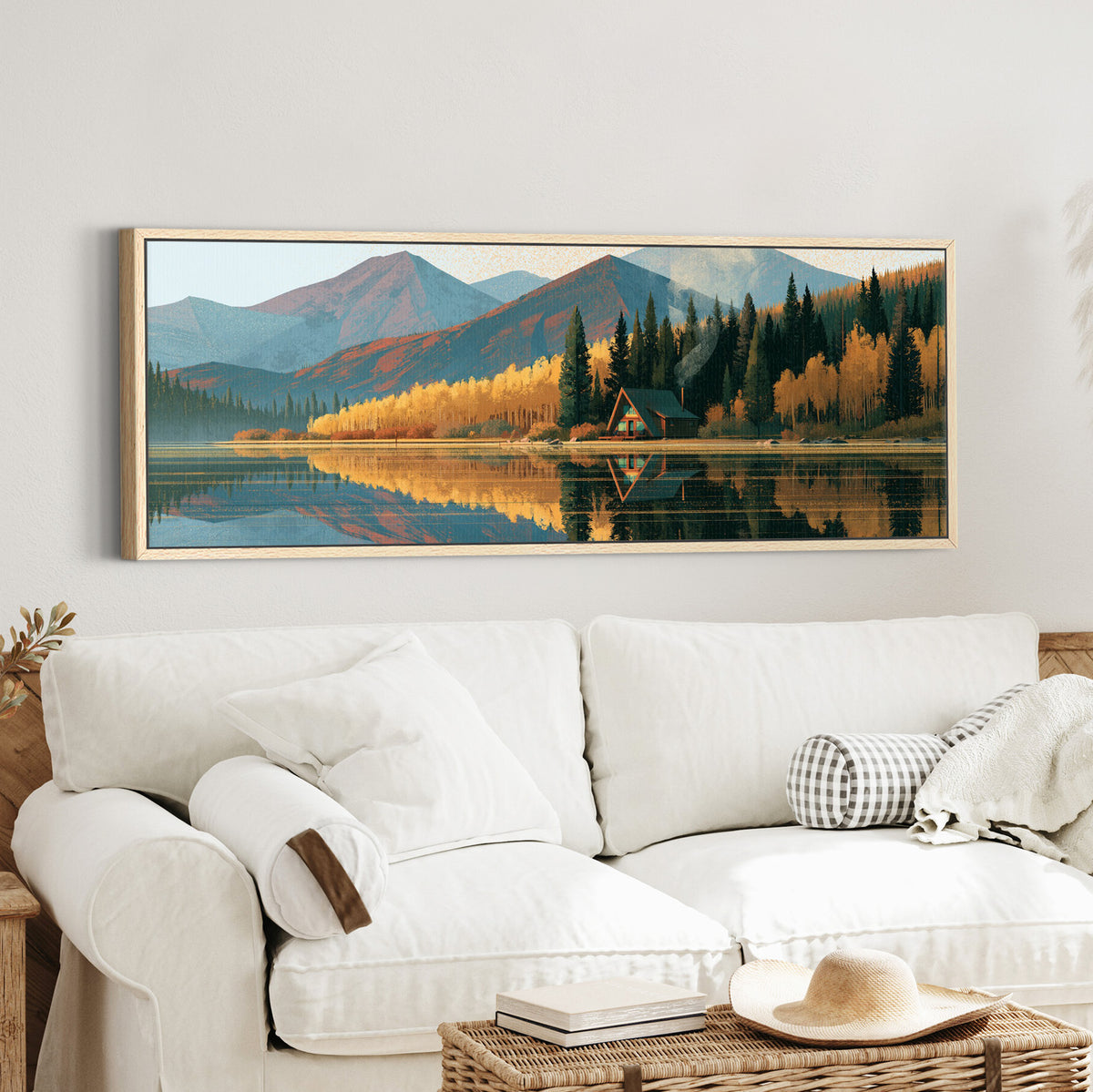 lakeside a frame cabin beneath canvas wall art in an oak finish floater frame in a styled room setting