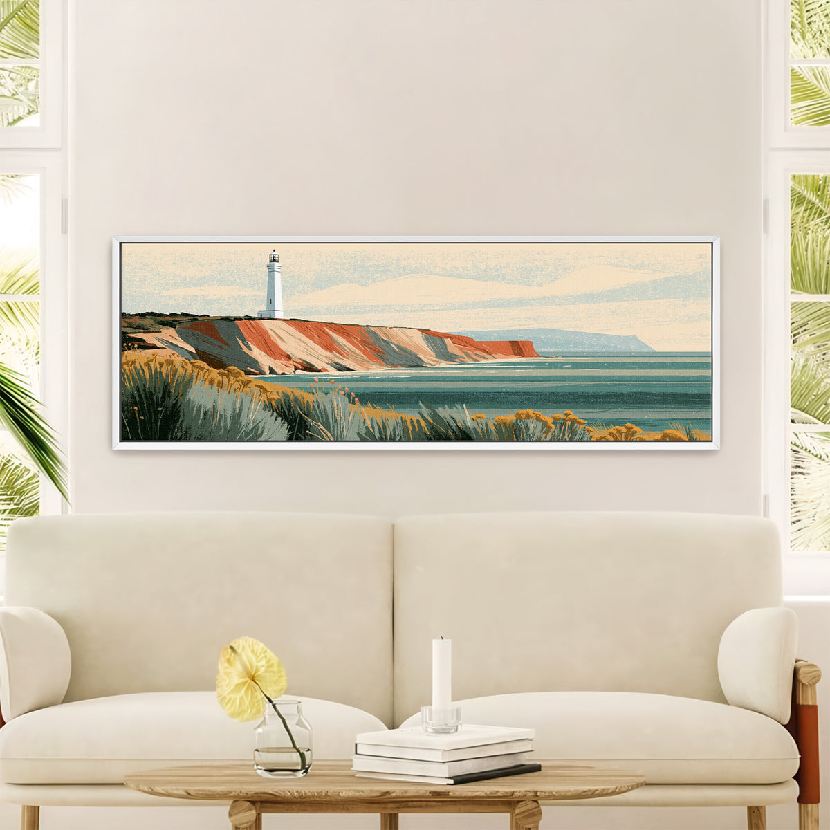 white lighthouse above terracotta canvas wall art in a white floater frame in a styled room setting