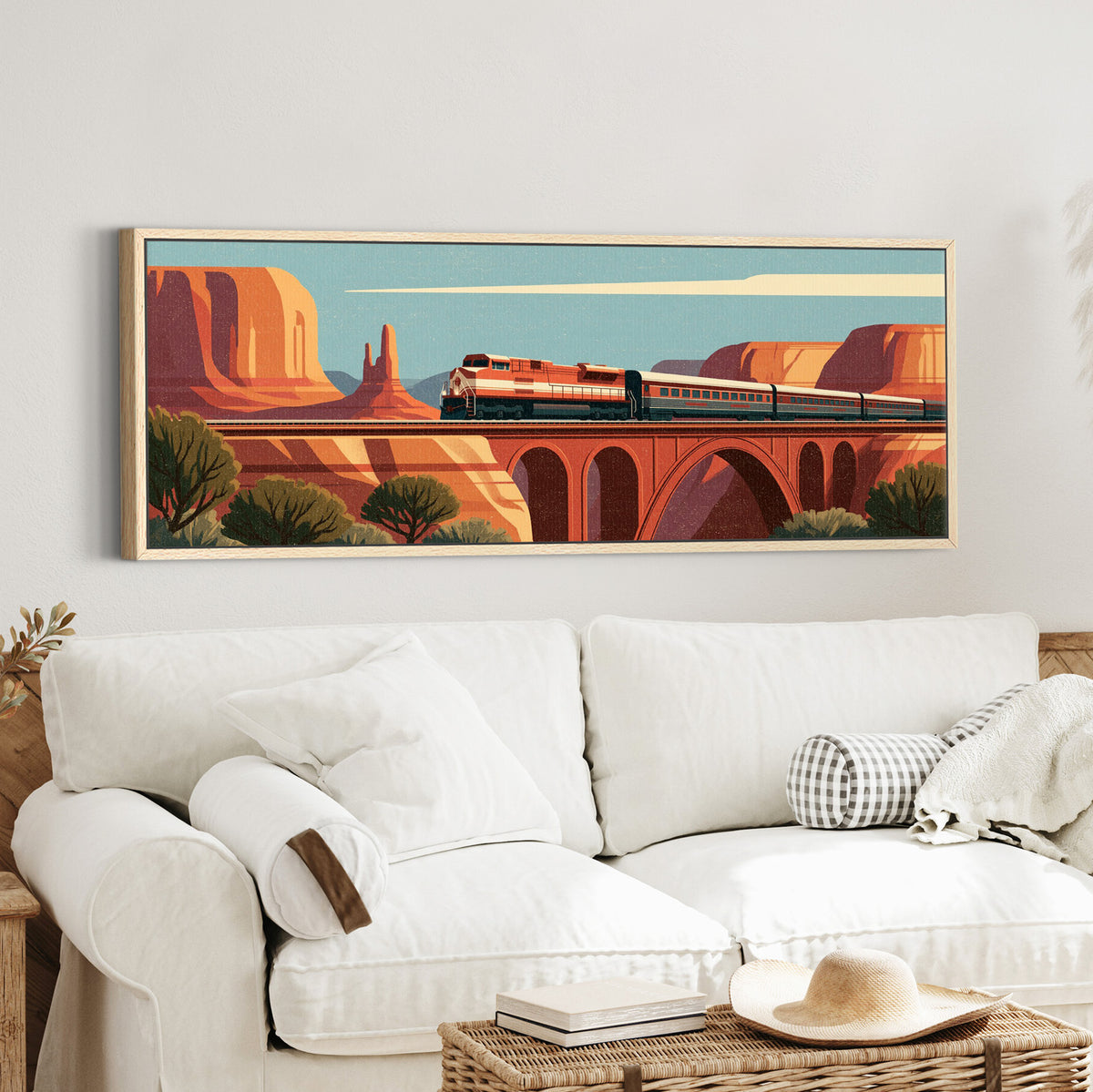 red and cream passenger train canvas wall art in an oak finish floater frame in a styled room setting